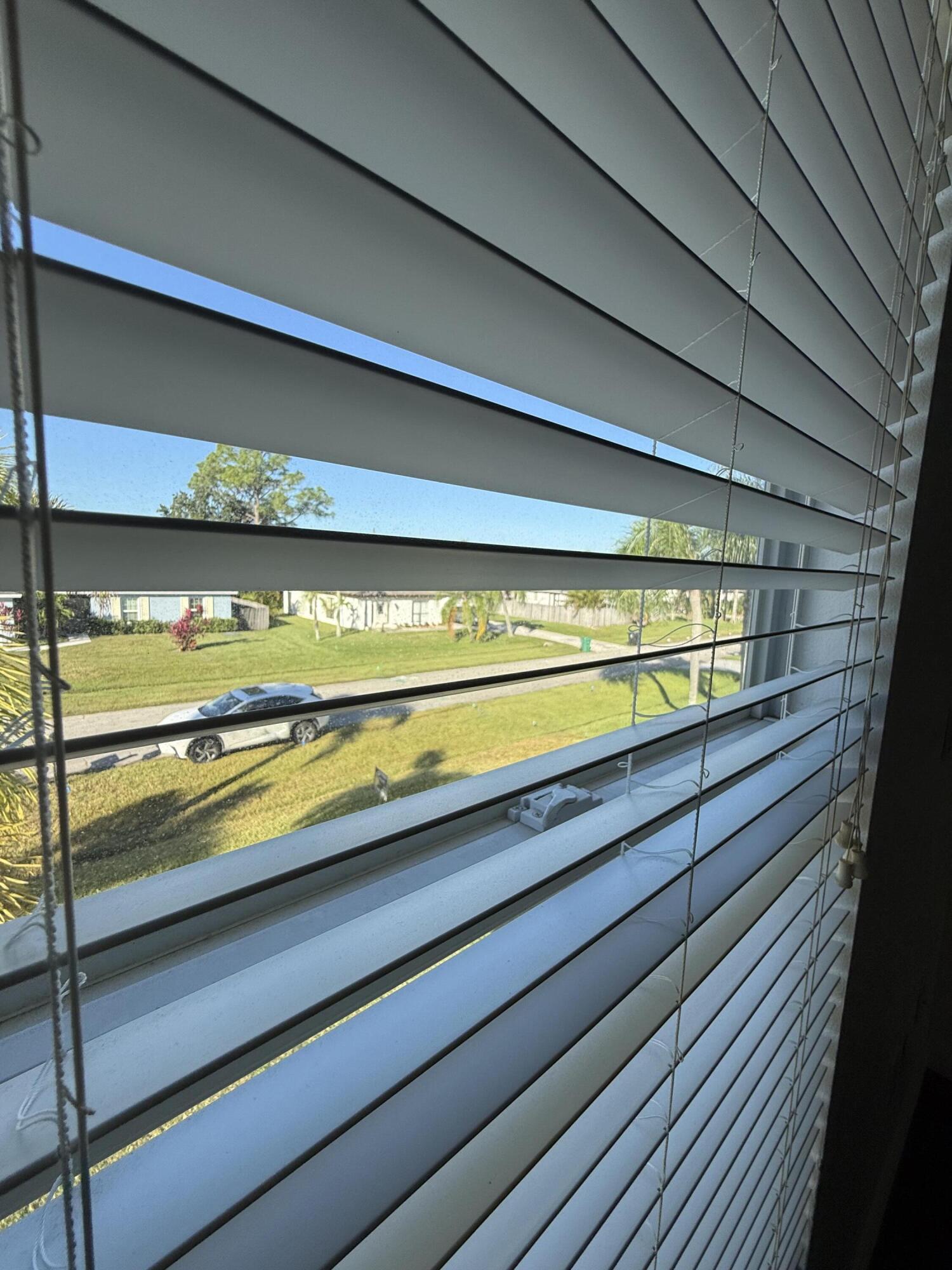 1925 Southwest Libra Lane Port St. Lucie, FL 34984 - Photo 31 of 49 a view of a room with a bench