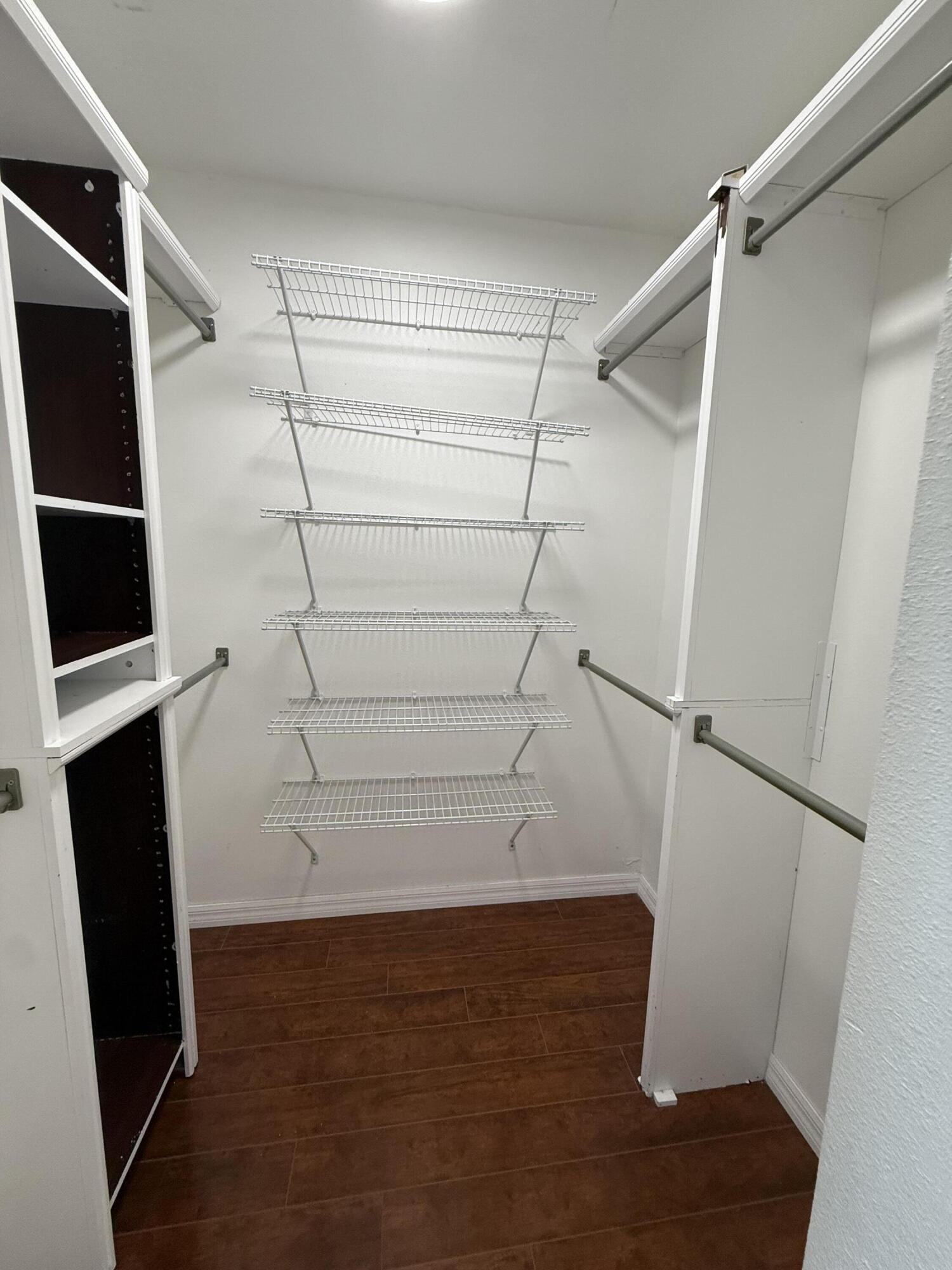 1925 Southwest Libra Lane Port St. Lucie, FL 34984 - Photo 43 of 49 a view of walk in closet