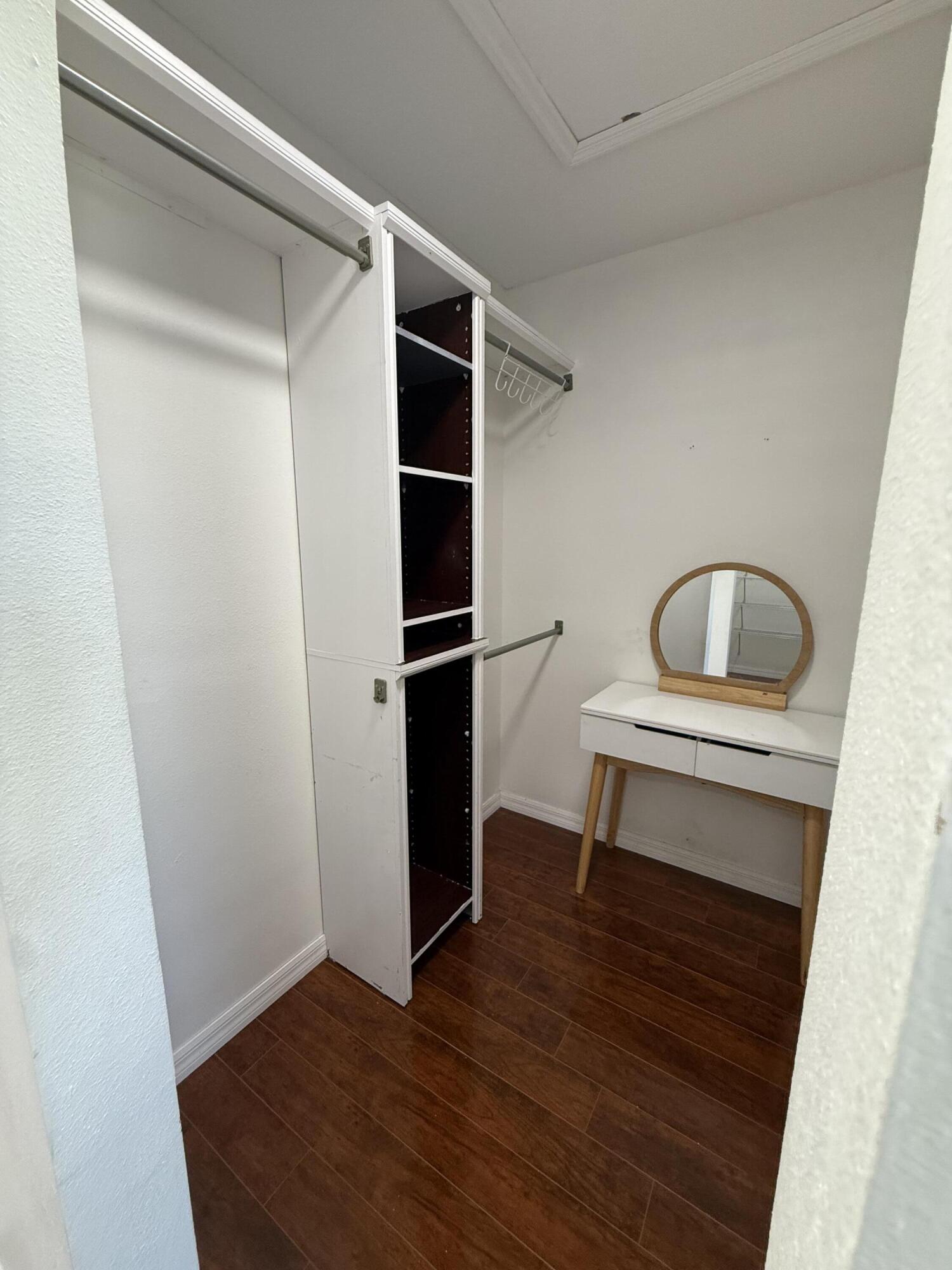 1925 Southwest Libra Lane Port St. Lucie, FL 34984 - Photo 45 of 49 a room with storage and utility