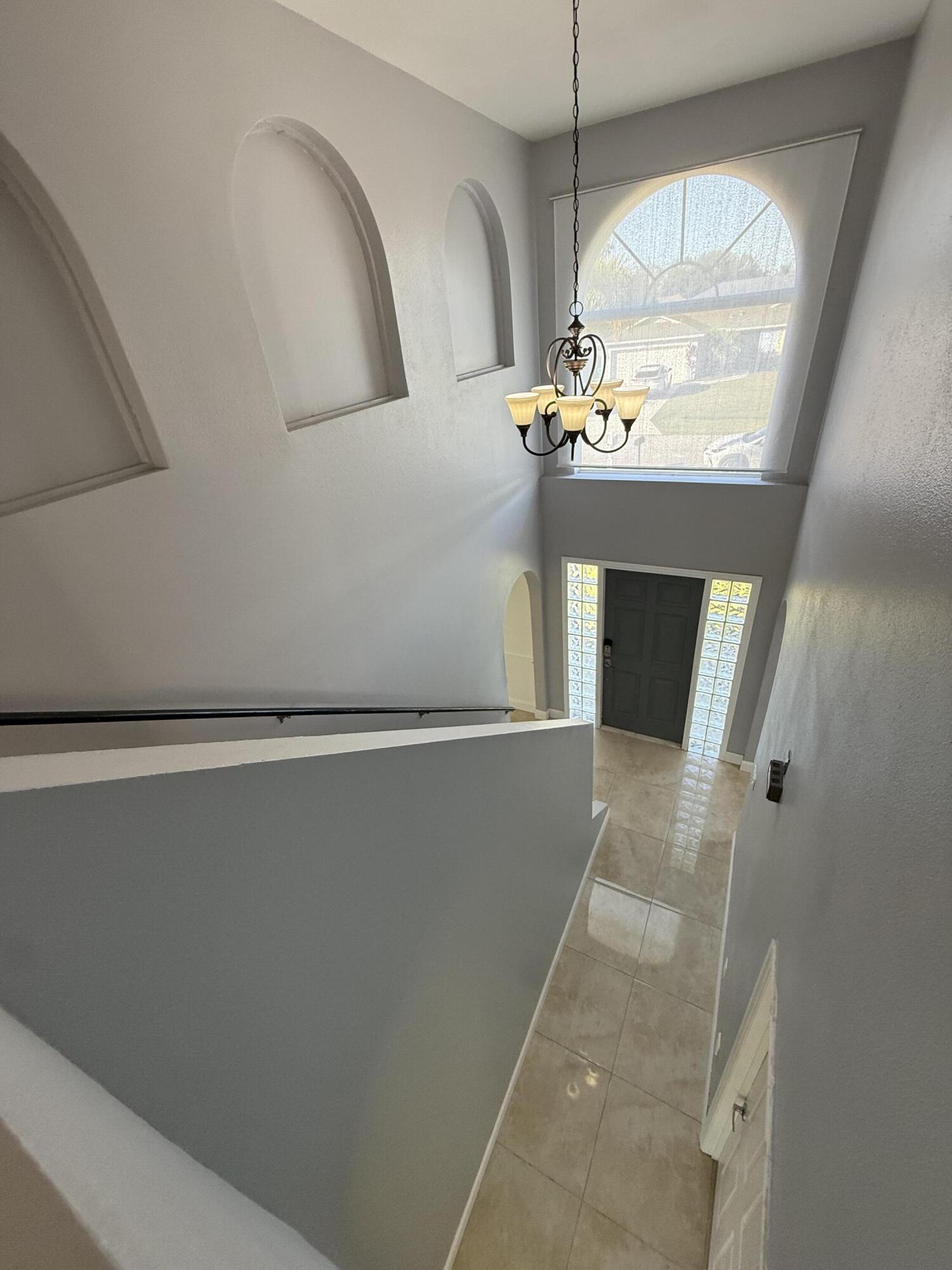 1925 Southwest Libra Lane Port St. Lucie, FL 34984 - Photo 49 of 49 a view of a livingroom with wooden floor