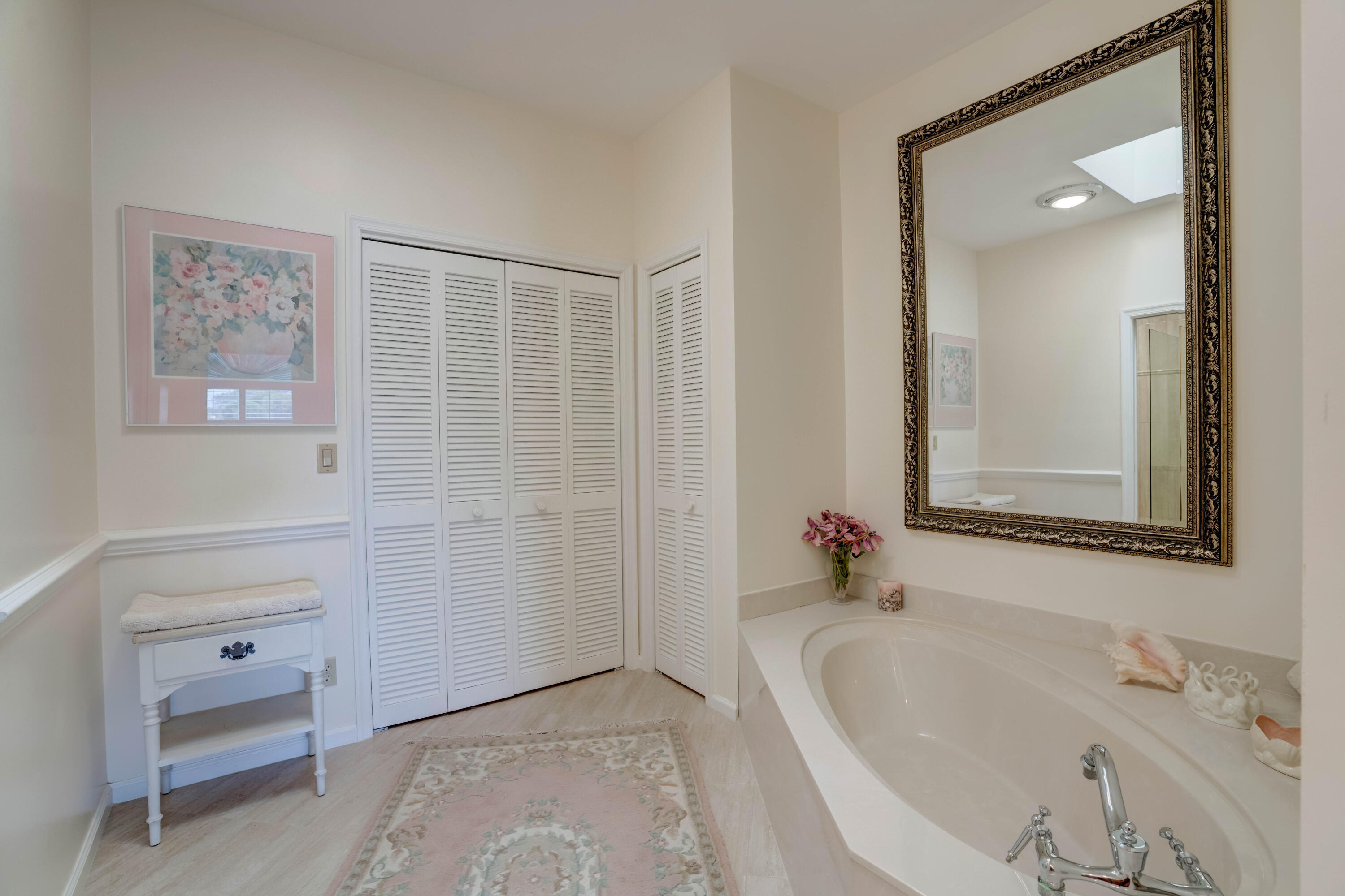 3518 Lantern Bay Drive Jupiter, FL 33477 - Photo 20 of 32 a bathroom with a bathtub and a sink