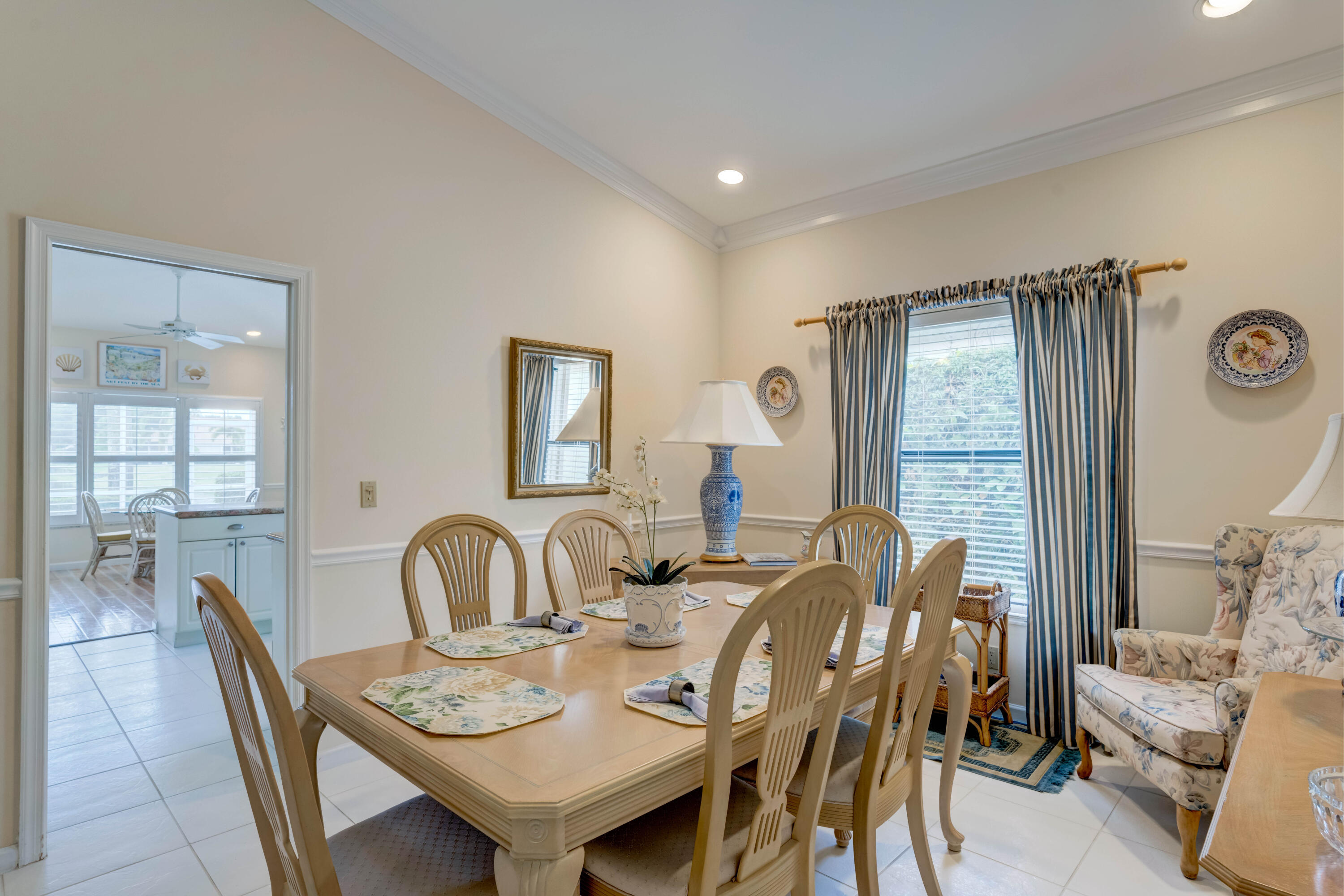 3518 Lantern Bay Drive Jupiter, FL 33477 - Photo 24 of 32 a dining room with furniture and window