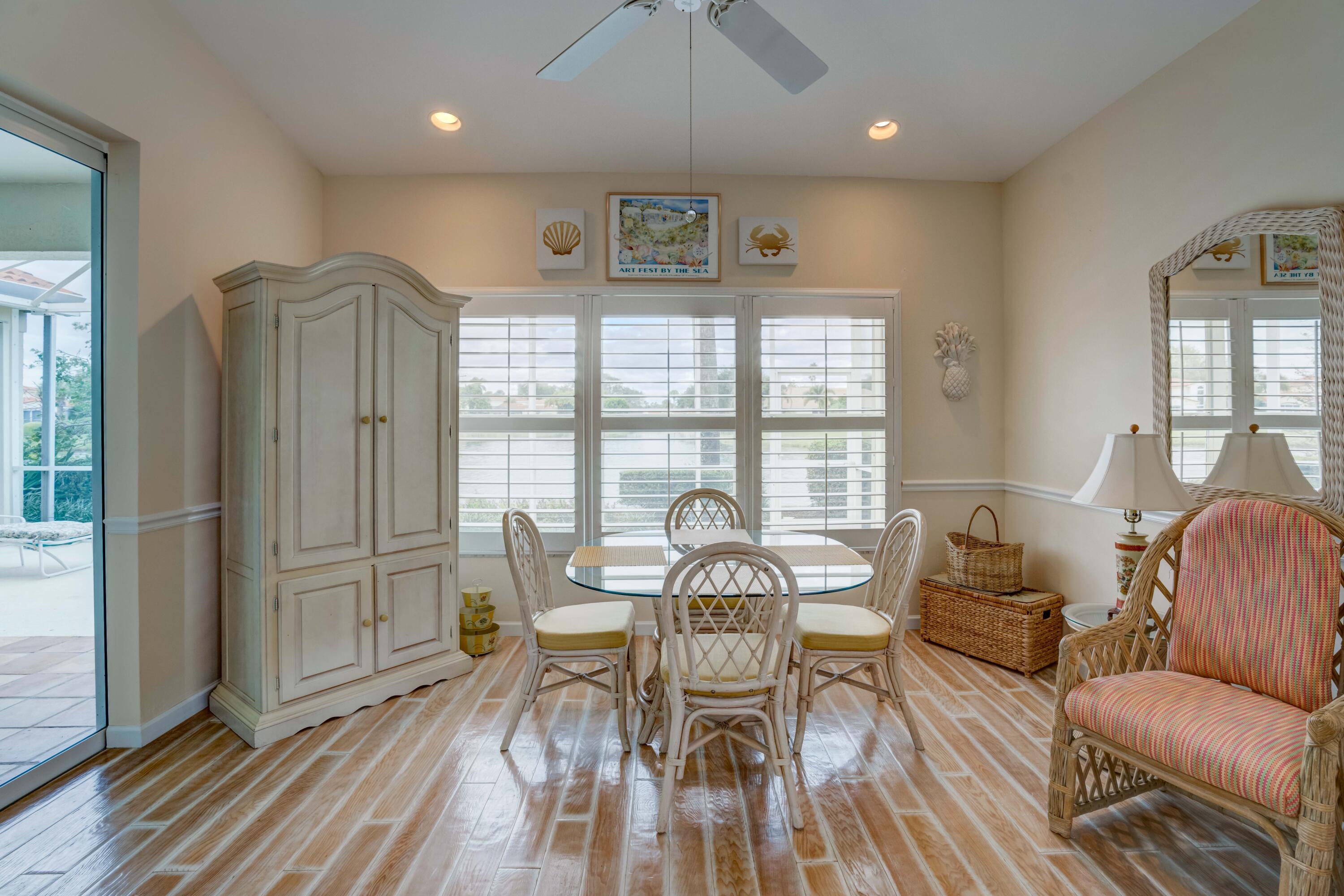 3518 Lantern Bay Drive Jupiter, FL 33477 - Photo 29 of 32 a view of a dining room with furniture window and outside view
