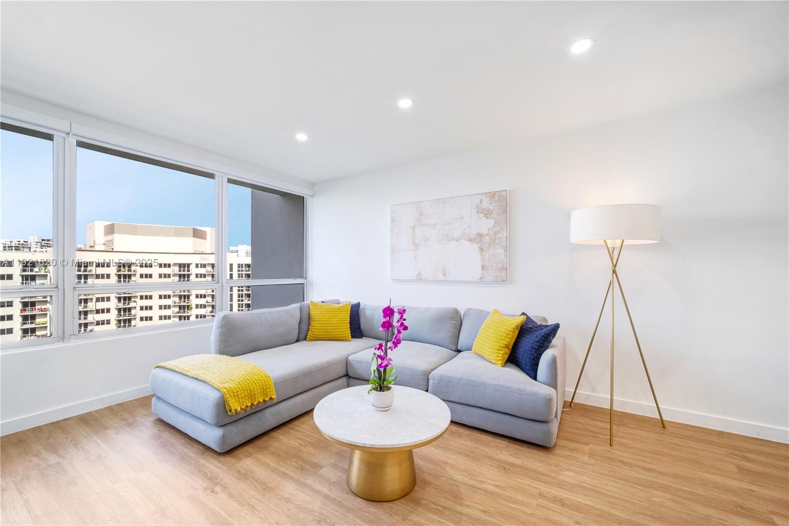 1500 Bay Road, Unit 1558S Miami Beach, FL 33139 - Photo 16 of 54 a living room with furniture and a wooden floor