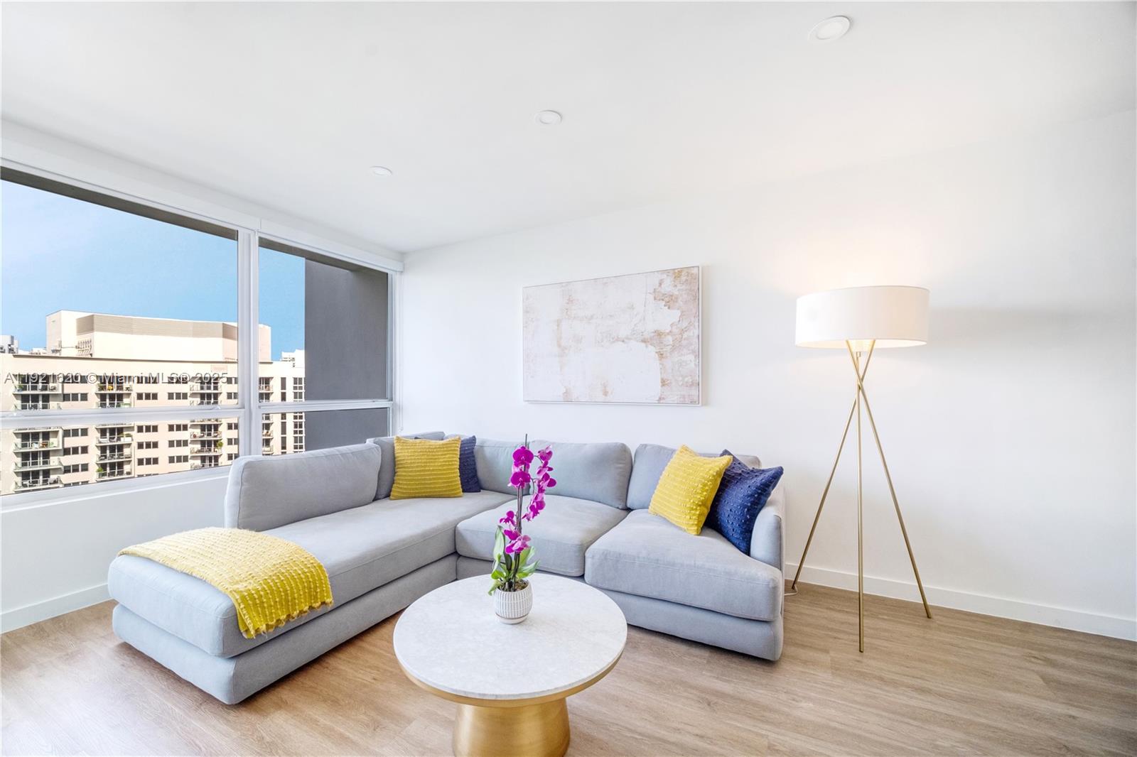 1500 Bay Road, Unit 1558S Miami Beach, FL 33139 - Photo 17 of 54 a living room with furniture and a wooden floor