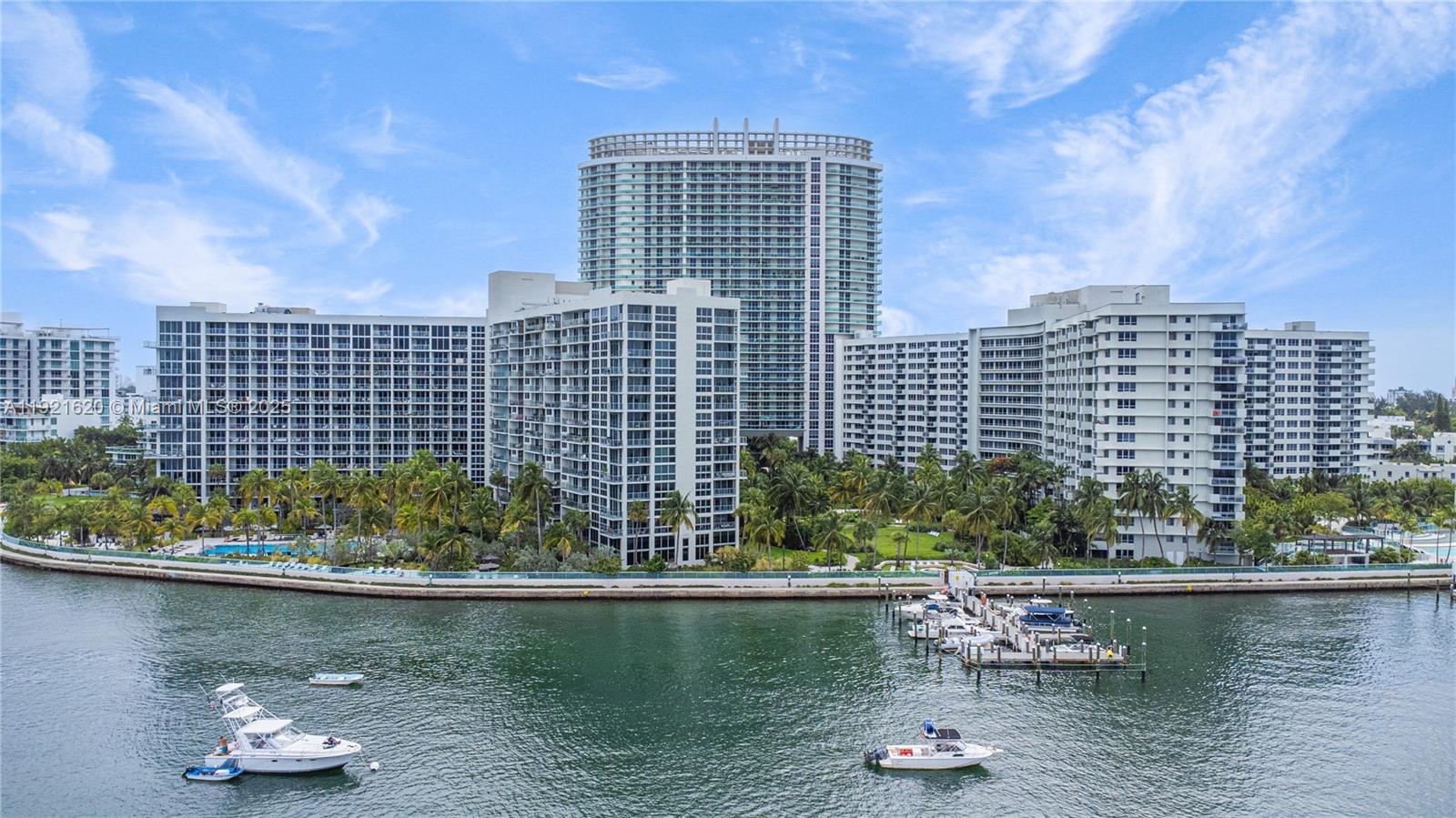 1500 Bay Road, Unit 1558S Miami Beach, FL 33139 - Photo 47 of 54 a view of a lake with a city skyline in the background