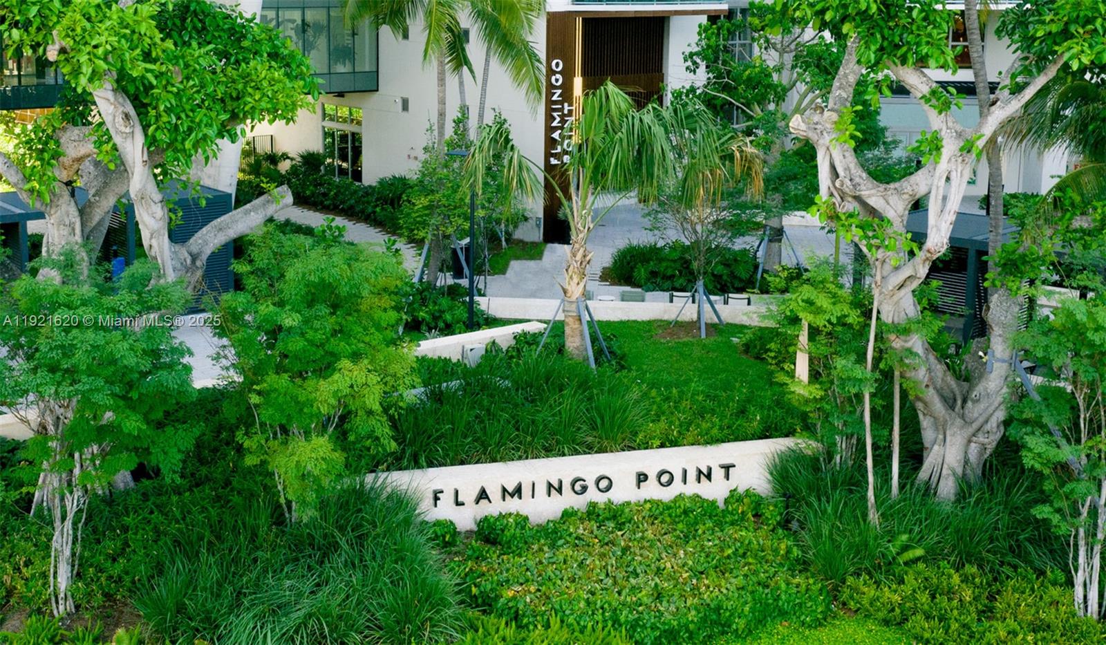 1500 Bay Road, Unit 1558S Miami Beach, FL 33139 - Photo 50 of 54 a view of a sign in a garden
