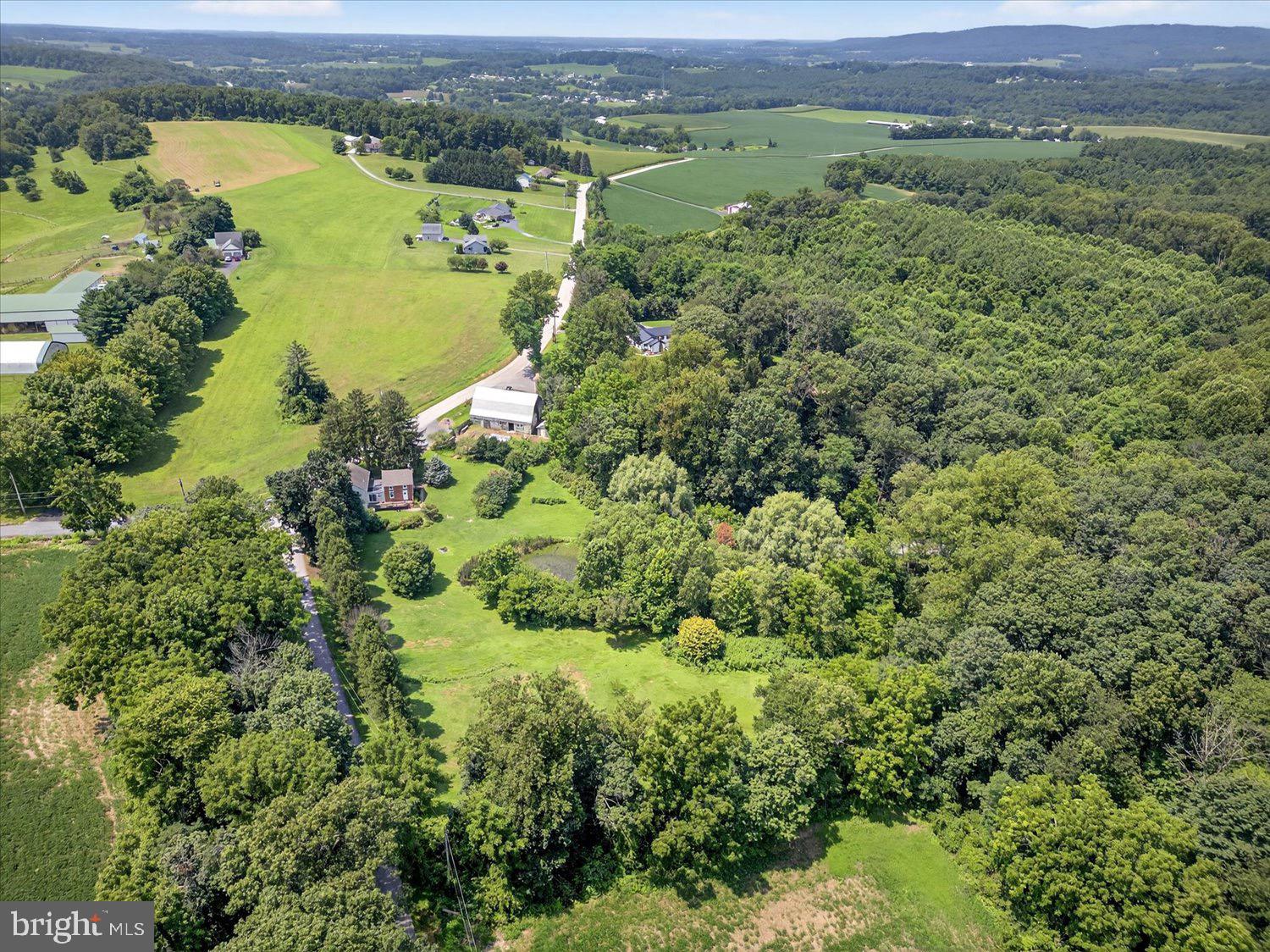 5605 Waltersdorff Road Spring Grove, PA 17362 - Photo 37 of 40 an aerial view of a houses with a lake view