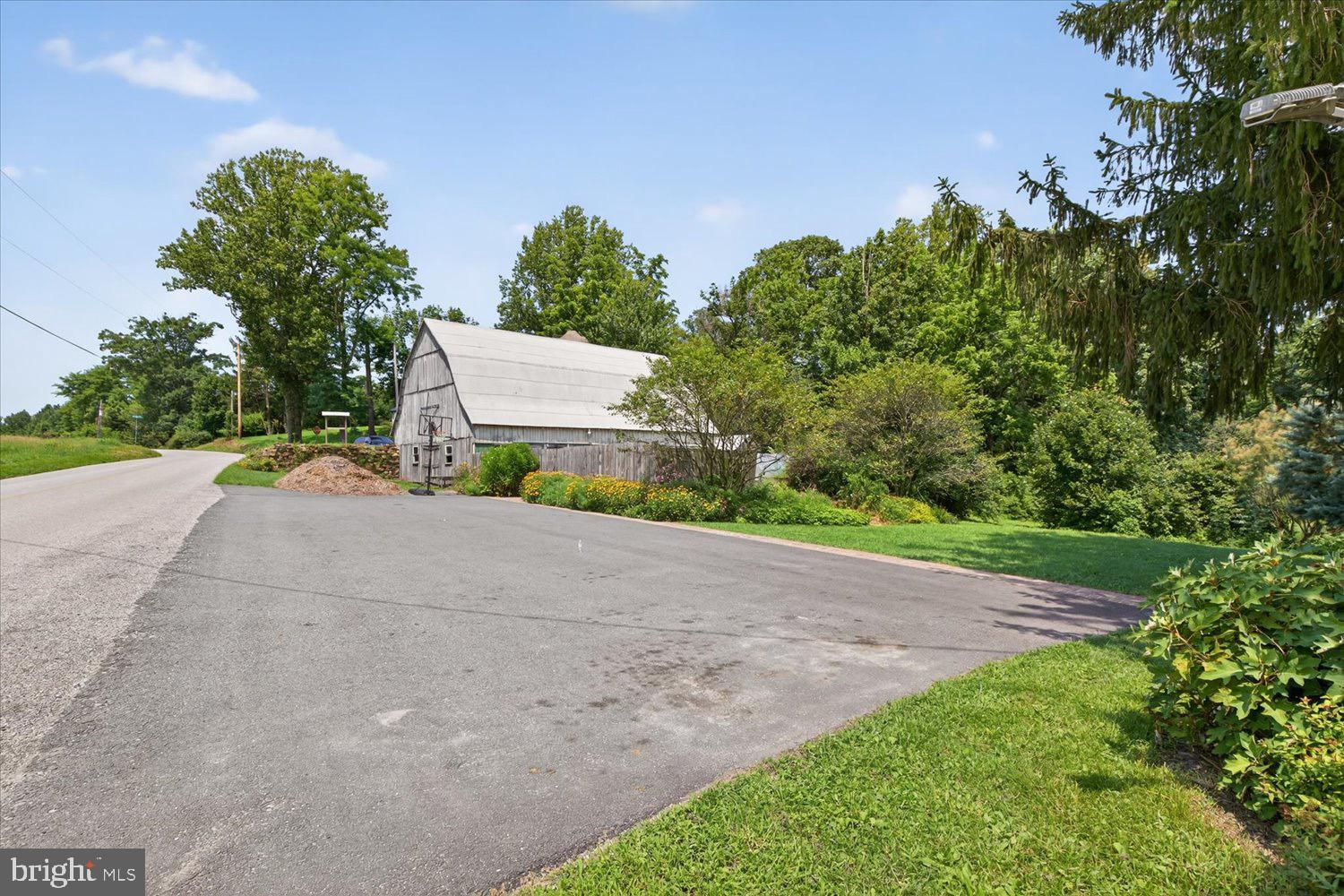 5605 Waltersdorff Road Spring Grove, PA 17362 - Photo 5 of 40 a view of a road with a building in the background