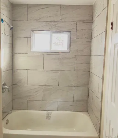 a bathroom with a bathtub