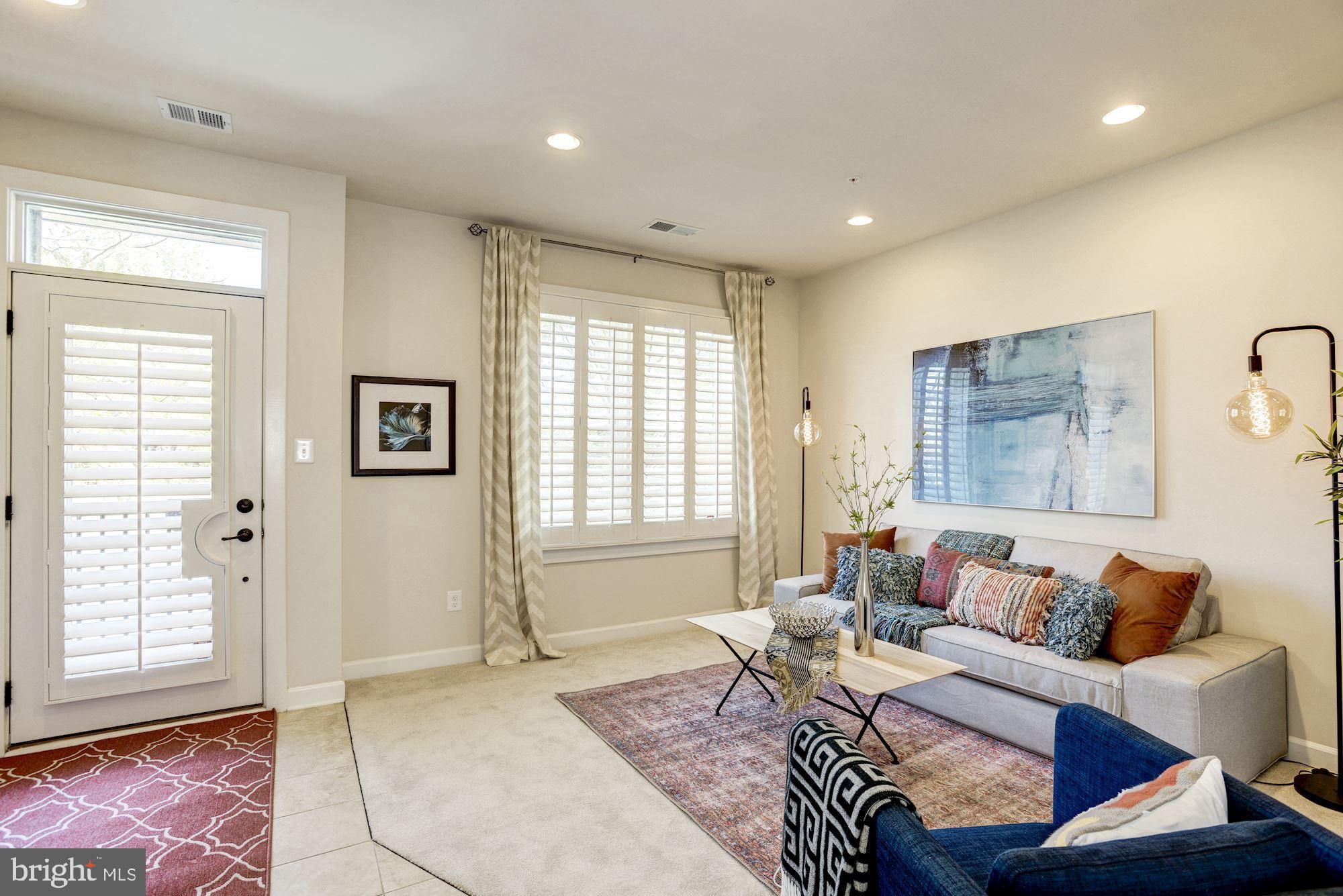 1140 South Glebe Road Arlington, VA 22204 - Photo 3 of 61 Entry Level Family Room with Recessed Lights