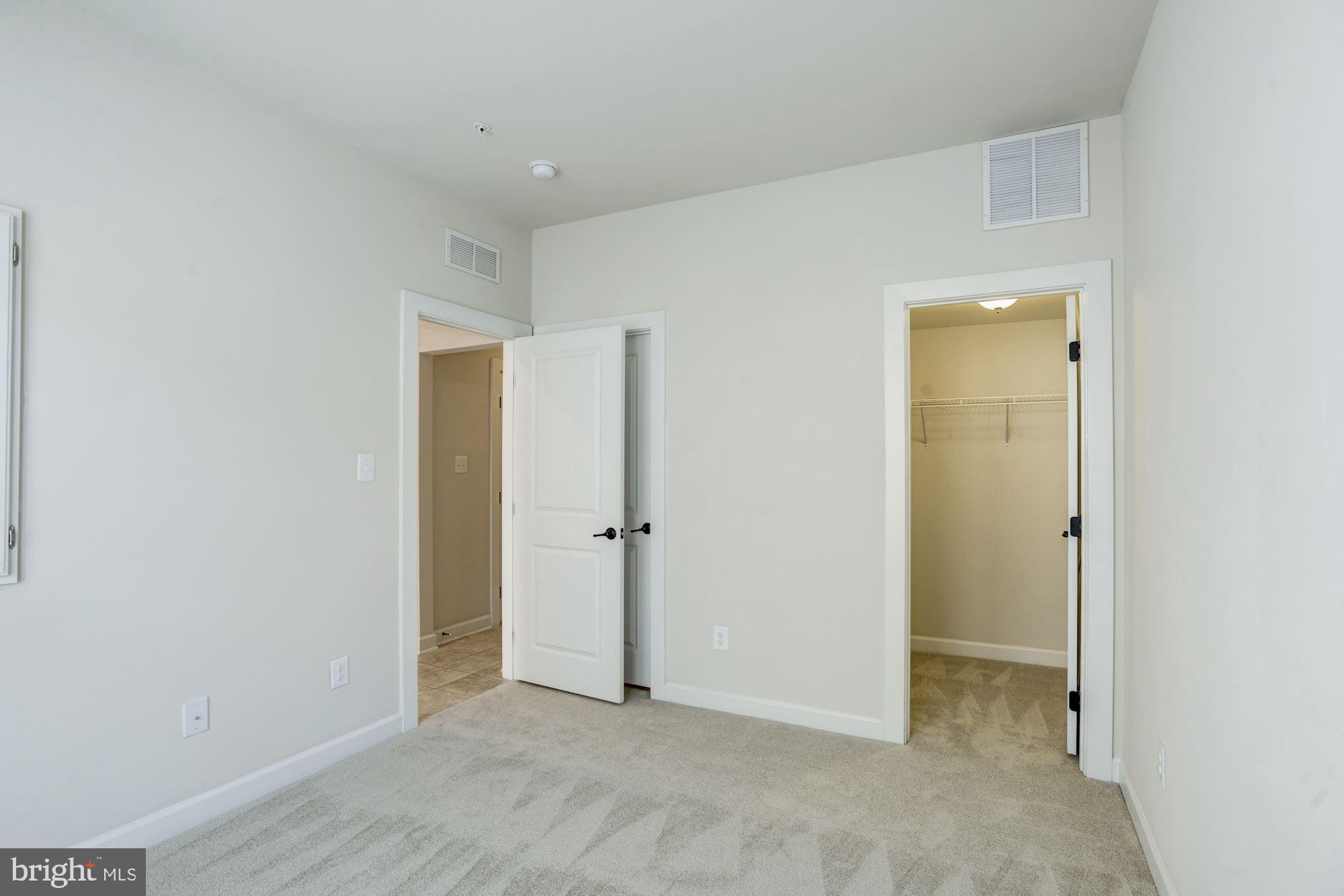 1140 South Glebe Road Arlington, VA 22204 - Photo 6 of 61 Entry Level Bedroom with Walk In Closet