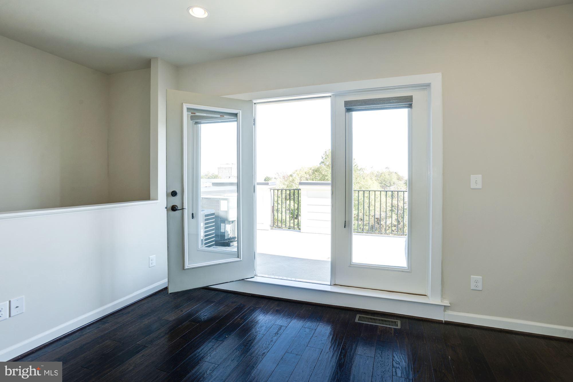 1140 South Glebe Road Arlington, VA 22204 - Photo 53 of 61 Top Floor Rec Room with French Doors to Terrace