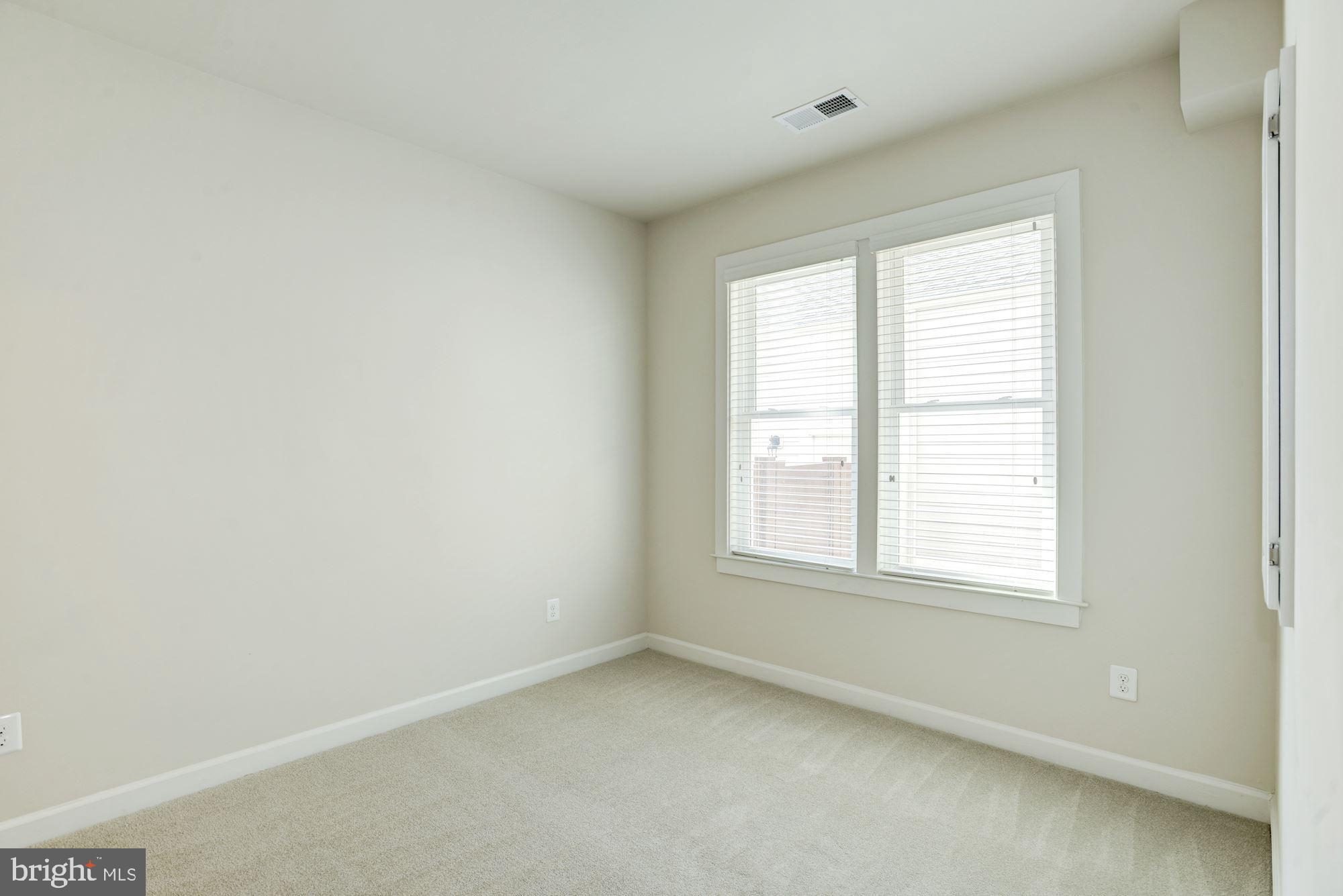 1140 South Glebe Road Arlington, VA 22204 - Photo 7 of 61 Entry Level Bedroom Looks Out to Private Patio