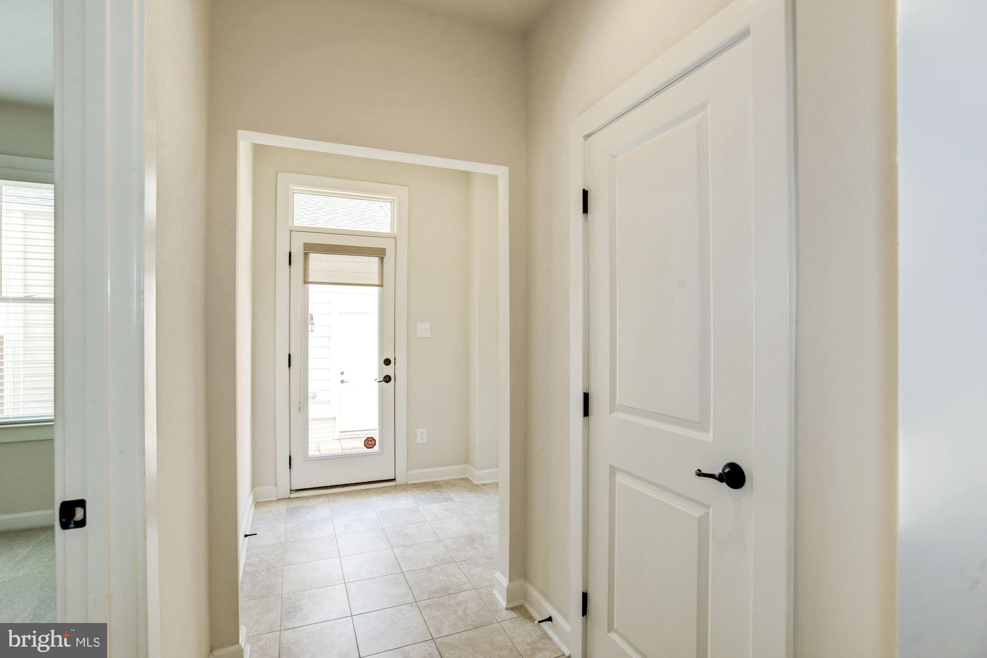 1140 South Glebe Road Arlington, VA 22204 - Photo 10 of 61 Entry Level Rear Exit to Private Patio and Garage