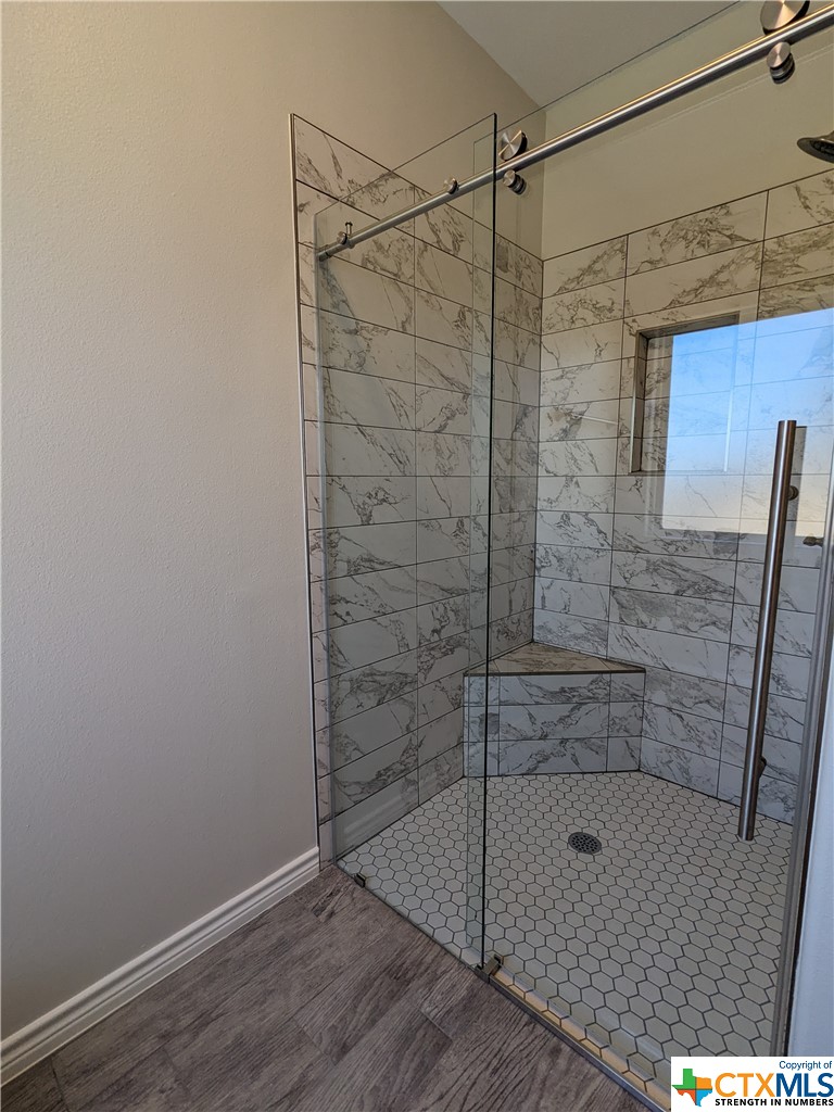 407 Gamel Street Lampasas, TX 76550 - Photo 14 of 20 a bathroom with a shower