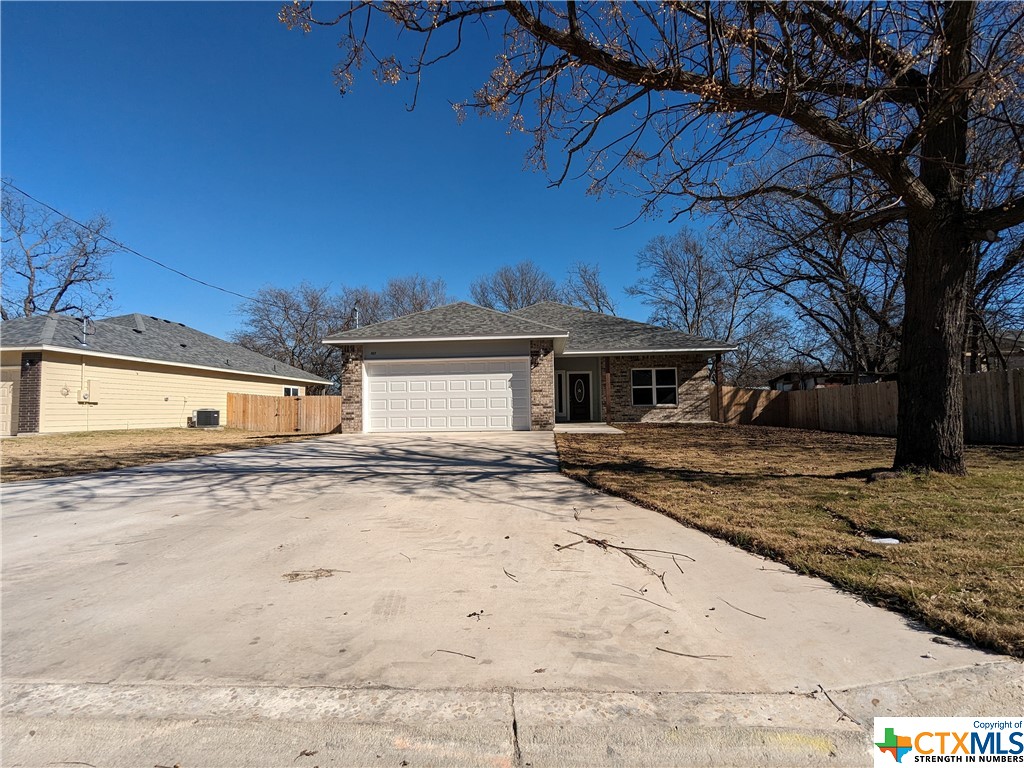 407 Gamel Street Lampasas, TX 76550 - Photo 2 of 20 a front view of a house with a yard