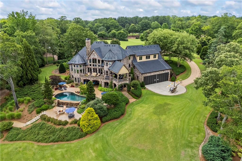 4239 Lower Jersey Road Covington, GA 30014 - Photo 18 of 91 an aerial view of a house with a garden