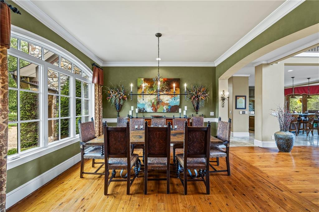 4239 Lower Jersey Road Covington, GA 30014 - Photo 39 of 91 a dining room with furniture window and wooden floor