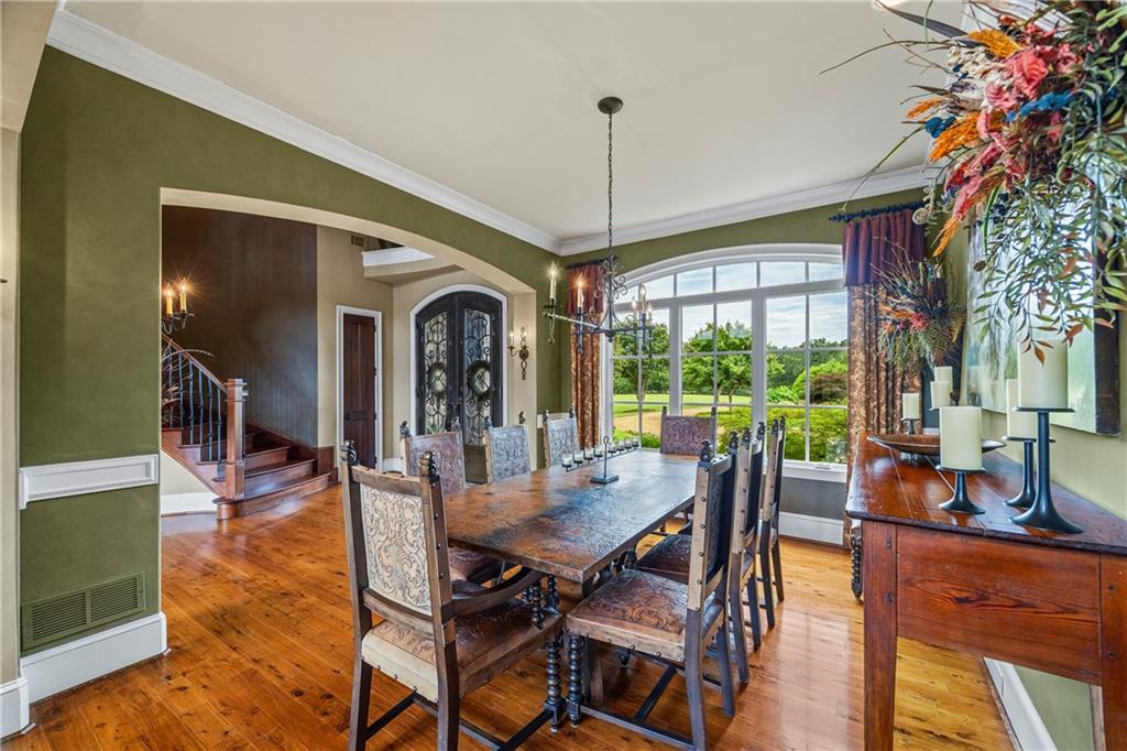 4239 Lower Jersey Road Covington, GA 30014 - Photo 40 of 91 a view of a dining room with furniture window and wooden floor