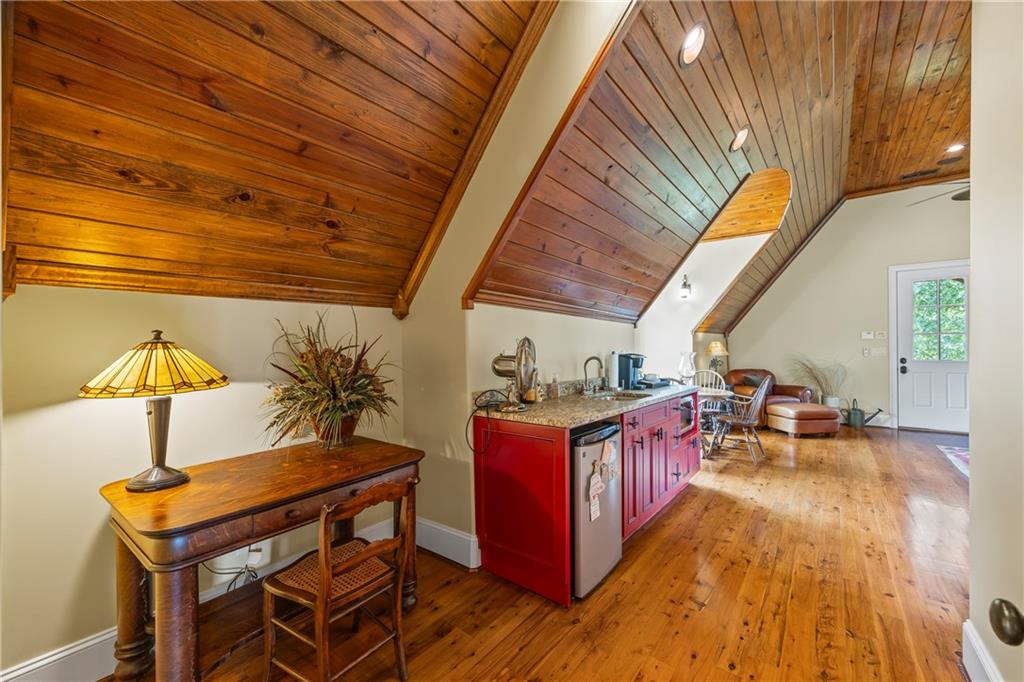 4239 Lower Jersey Road Covington, GA 30014 - Photo 63 of 91 a view of a chairs and table on the wooden roof