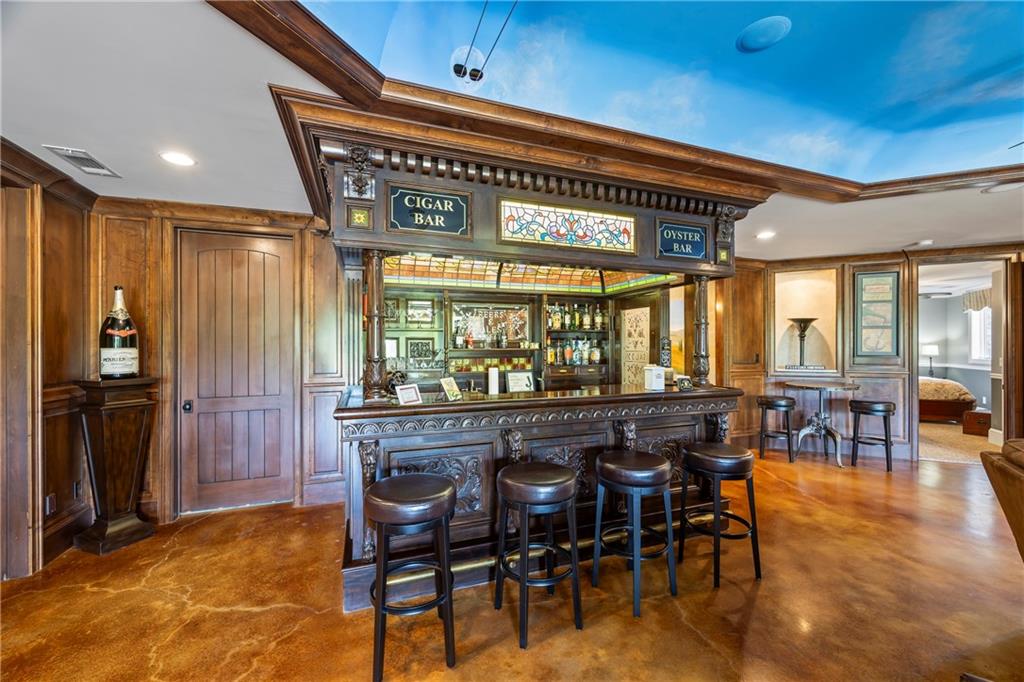 4239 Lower Jersey Road Covington, GA 30014 - Photo 76 of 91 a large kitchen with a table and chairs