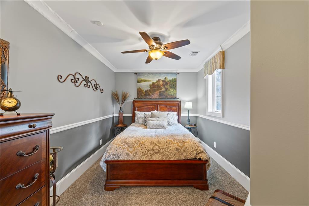 4239 Lower Jersey Road Covington, GA 30014 - Photo 81 of 91 a bed room with a bed and a window