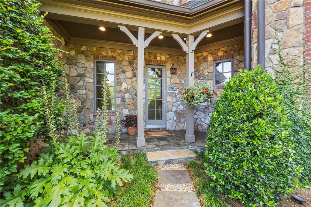 4239 Lower Jersey Road Covington, GA 30014 - Photo 87 of 91 a front view of a house with a porch