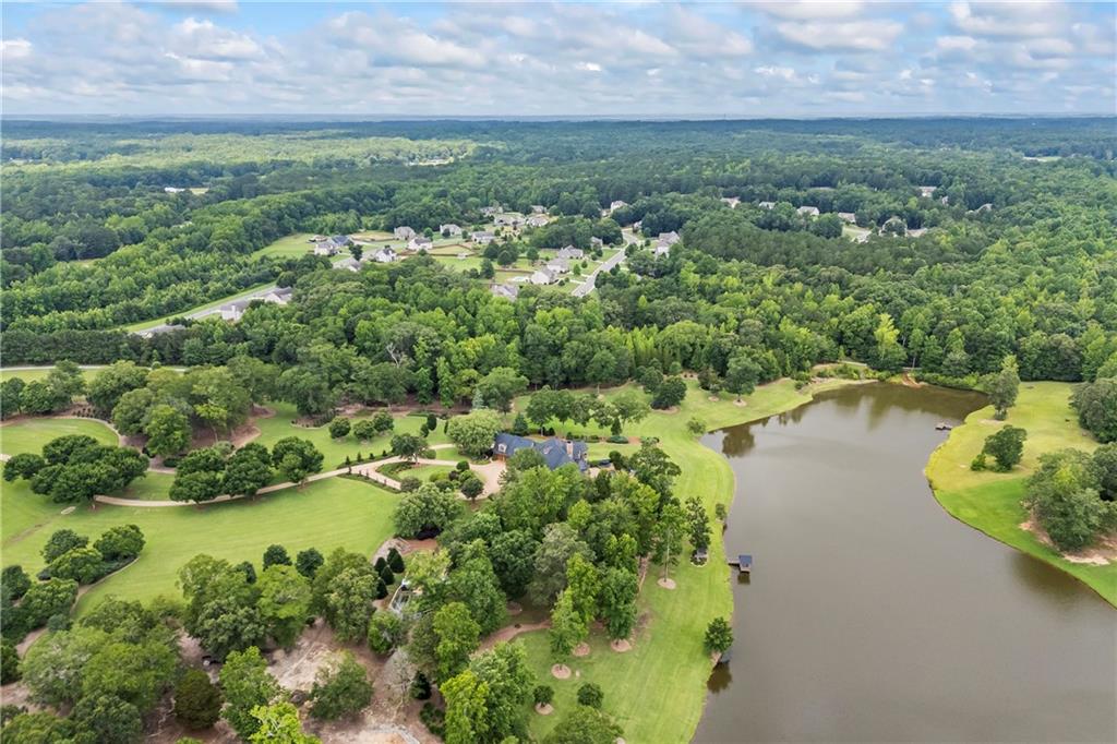 4239 Lower Jersey Road Covington, GA 30014 - Photo 10 of 91 an aerial view of a houses with yard and lake view
