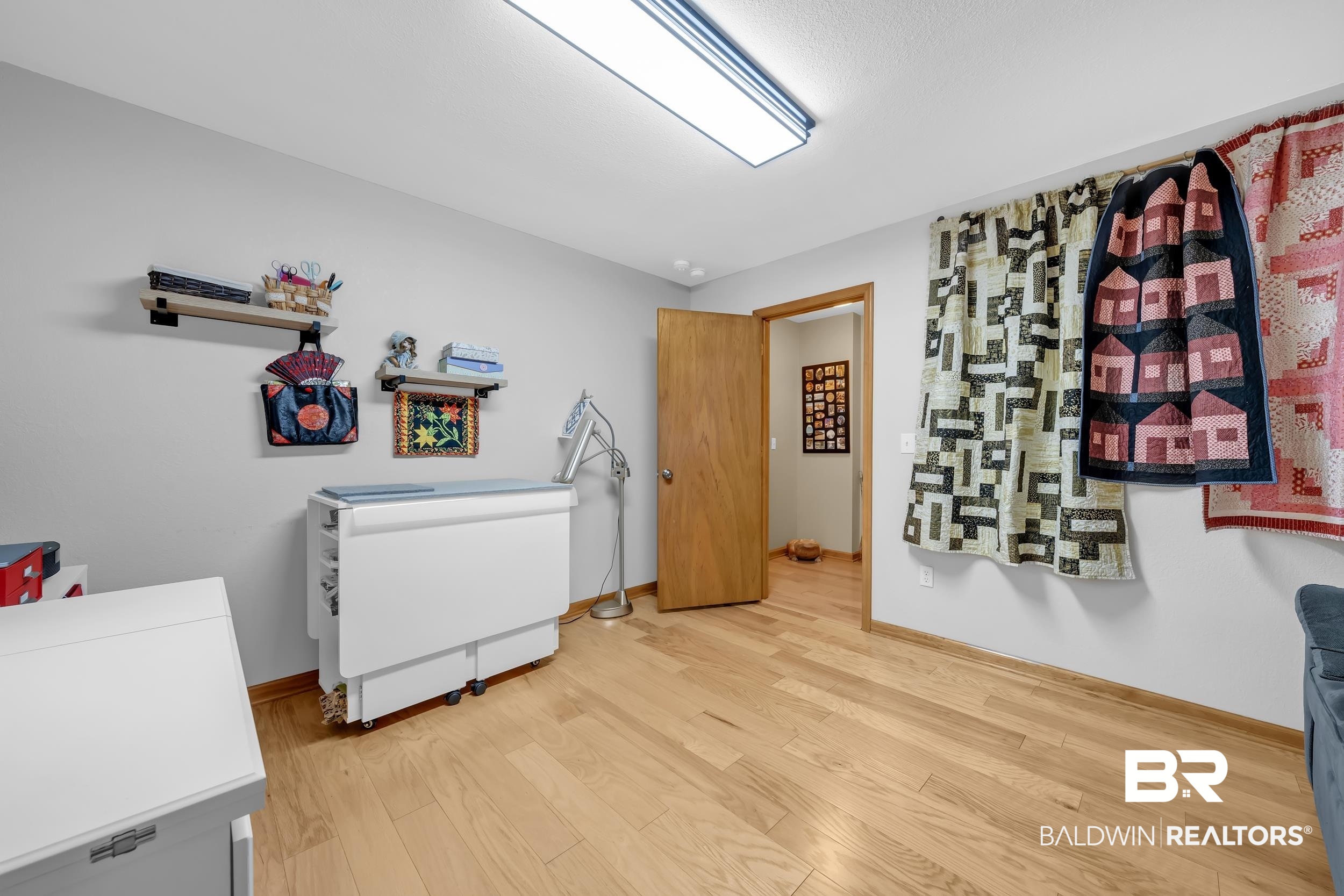 22929 Highway 98 Foley, AL 36535 - Photo 22 of 54 Laundry area featuring light wood-style floors and baseboards