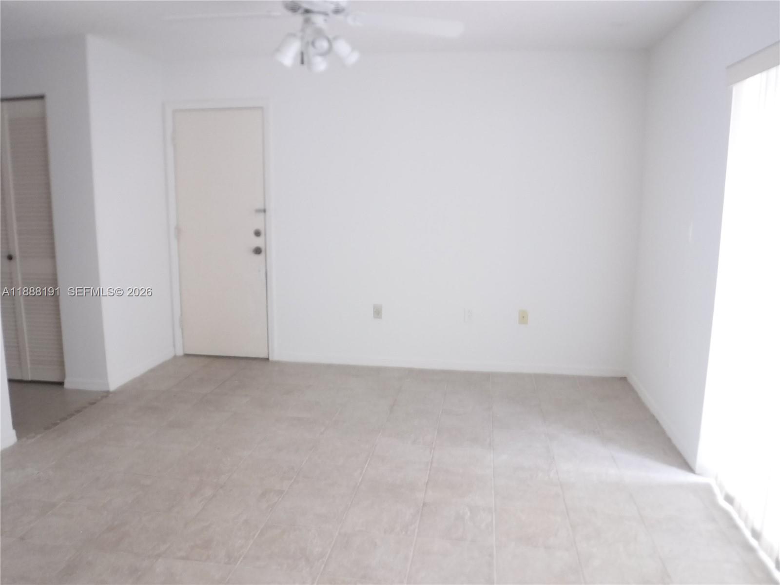 10889 Southwest 149th Place Miami, FL 33196 - Photo 19 of 51 an empty room with a bathroom