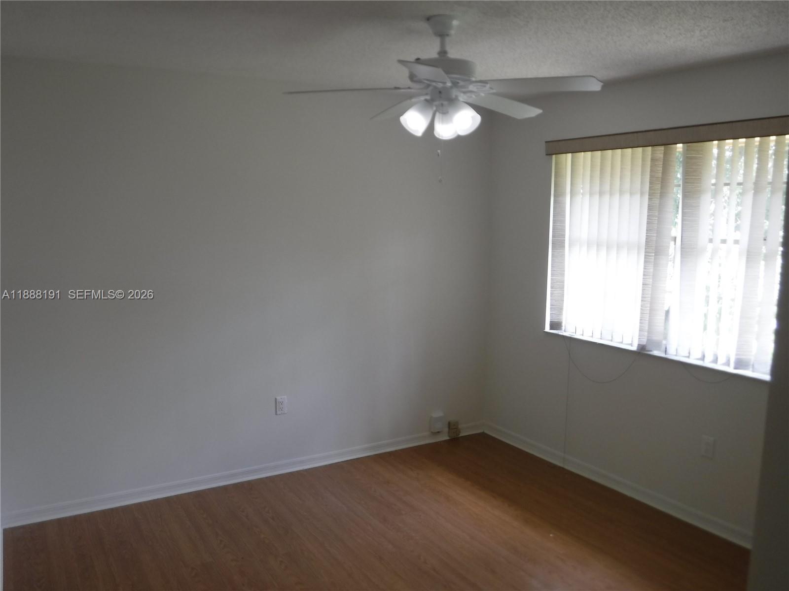 10889 Southwest 149th Place Miami, FL 33196 - Photo 28 of 51 an empty room with a window