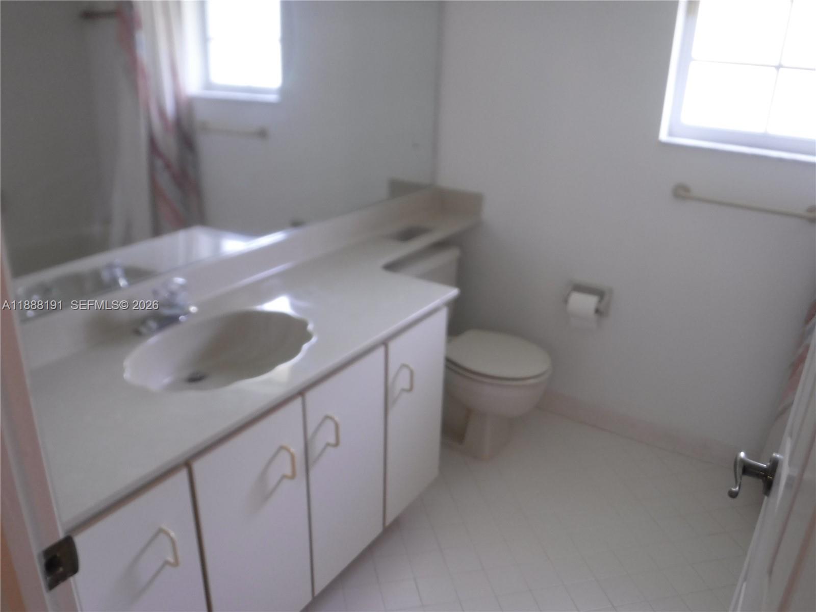 10889 Southwest 149th Place Miami, FL 33196 - Photo 29 of 51 Hallway Bathroom