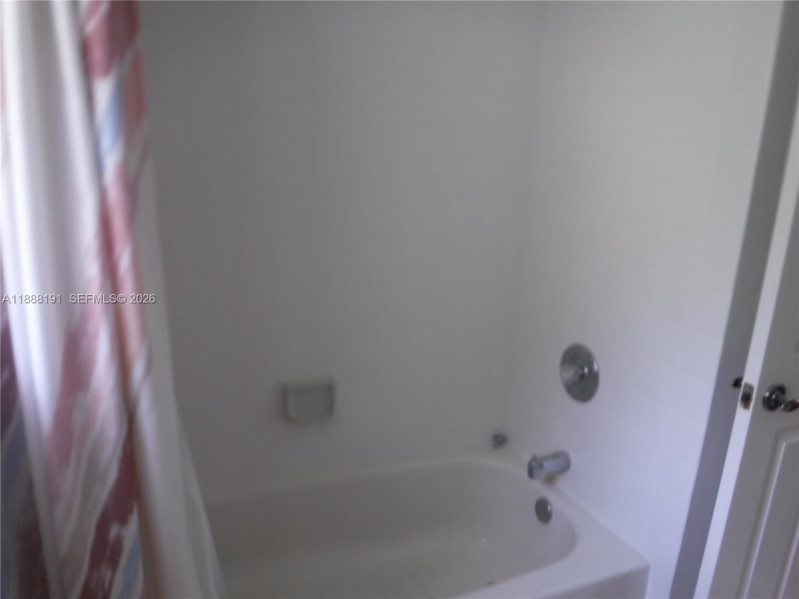 10889 Southwest 149th Place Miami, FL 33196 - Photo 30 of 51 a close up of a bathtub