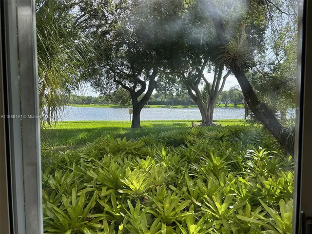 a view of a large window with an outdoor space