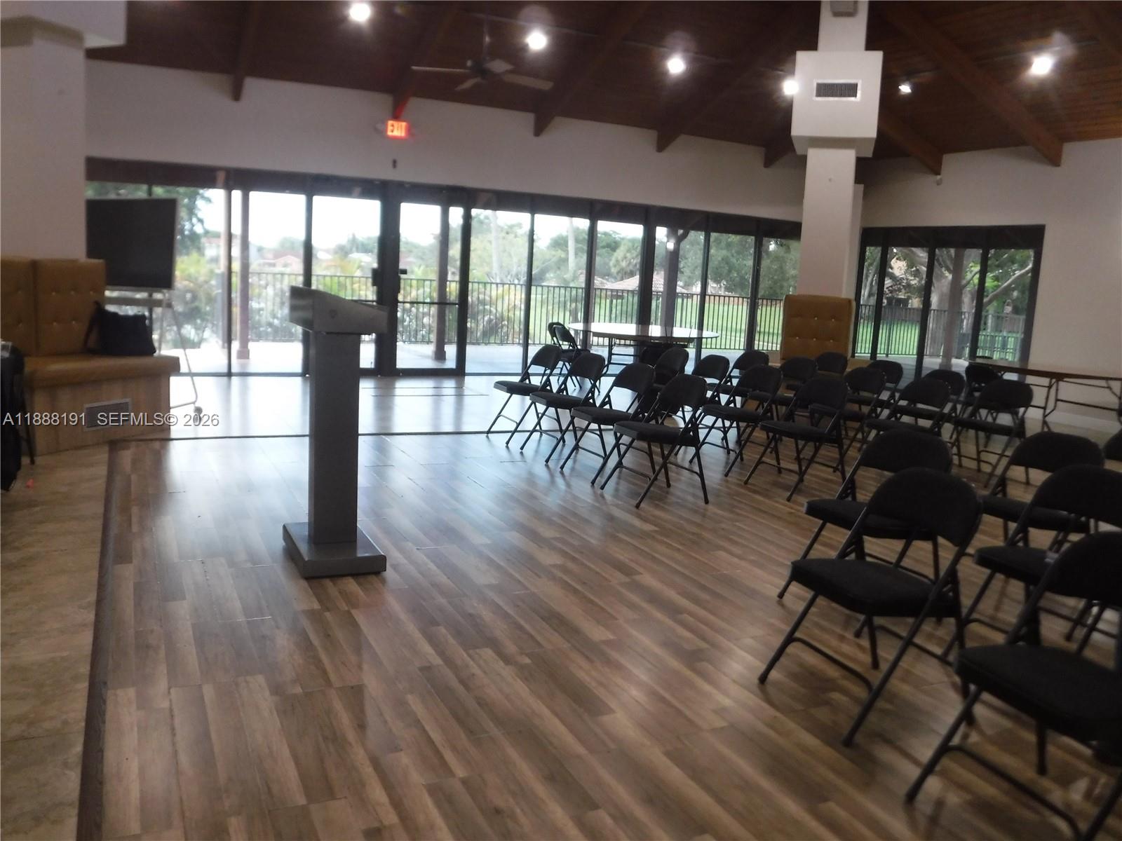 10889 Southwest 149th Place Miami, FL 33196 - Photo 43 of 51 a view of a dining room with furniture window and wooden floor