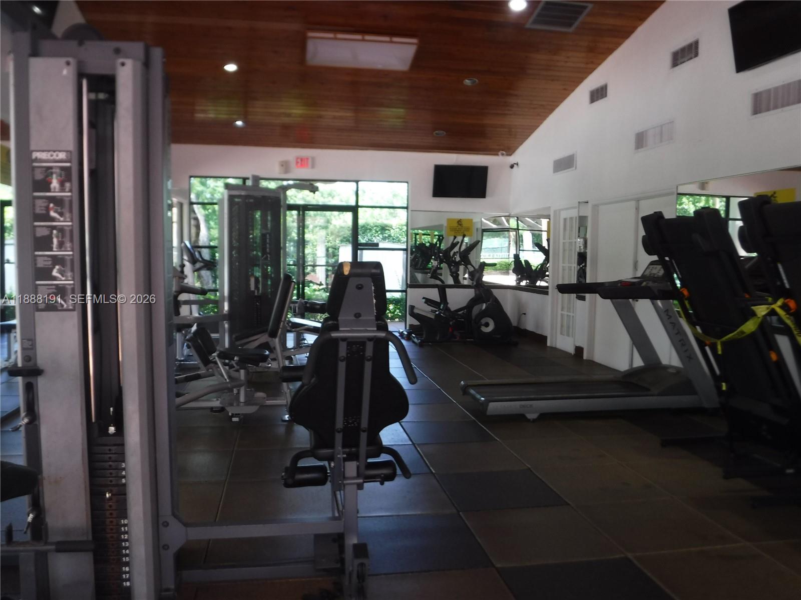 10889 Southwest 149th Place Miami, FL 33196 - Photo 51 of 51 a view of a room with gym equipment