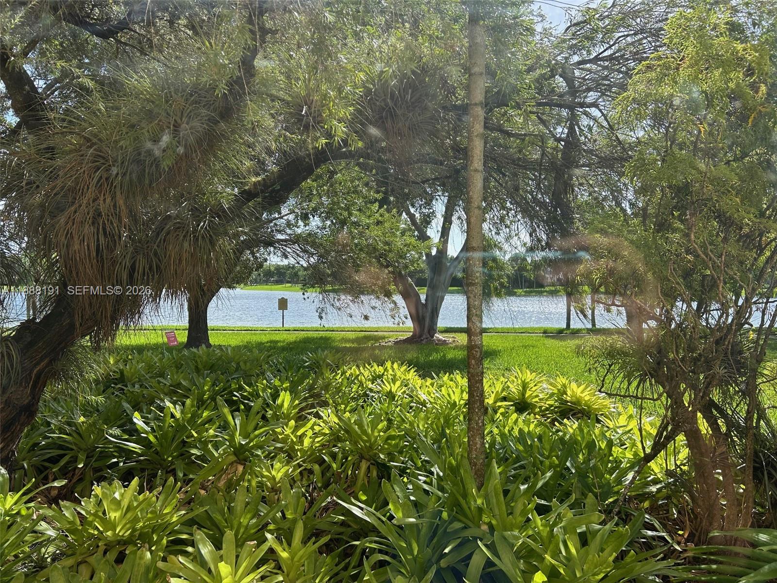 10889 Southwest 149th Place Miami, FL 33196 - Photo 6 of 51 View of Lake From Living Room