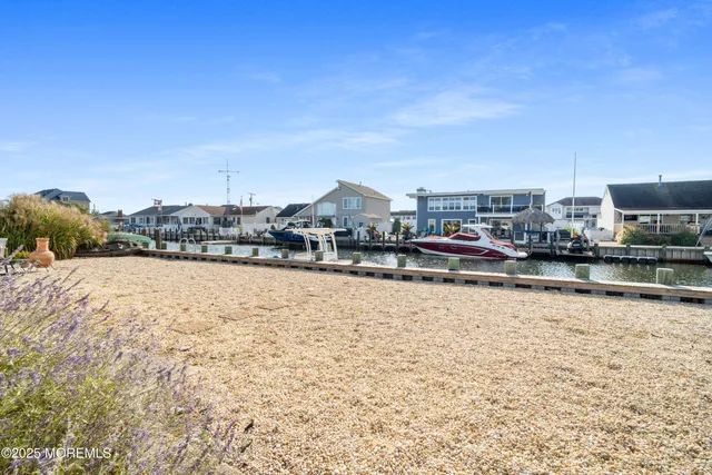 a swimming pool view with a lake view