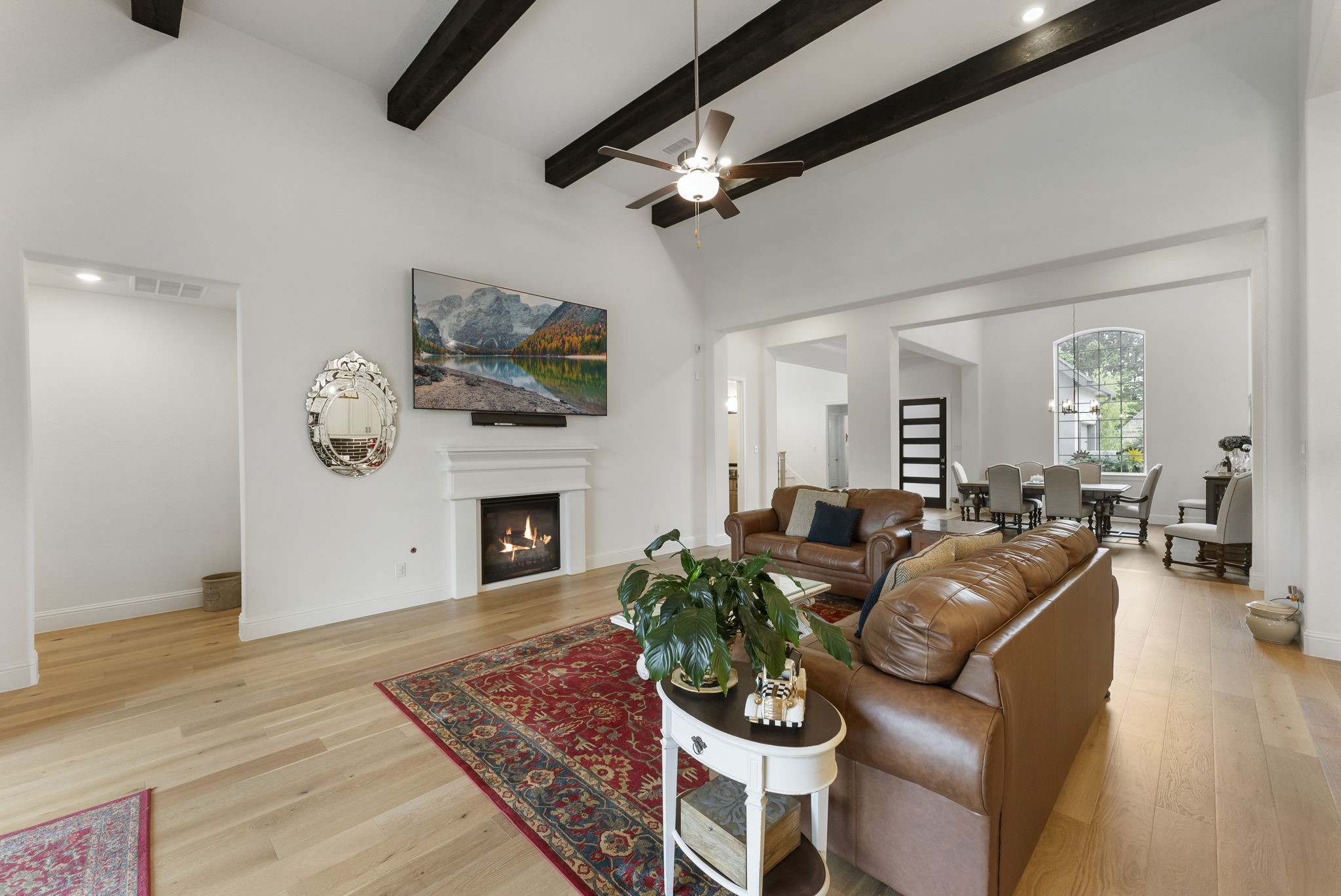 12932 Whitewater Way Conroe, TX 77302 - Photo 7 of 48 Elegant cedar beams highlight the home’s thoughtful custom design.