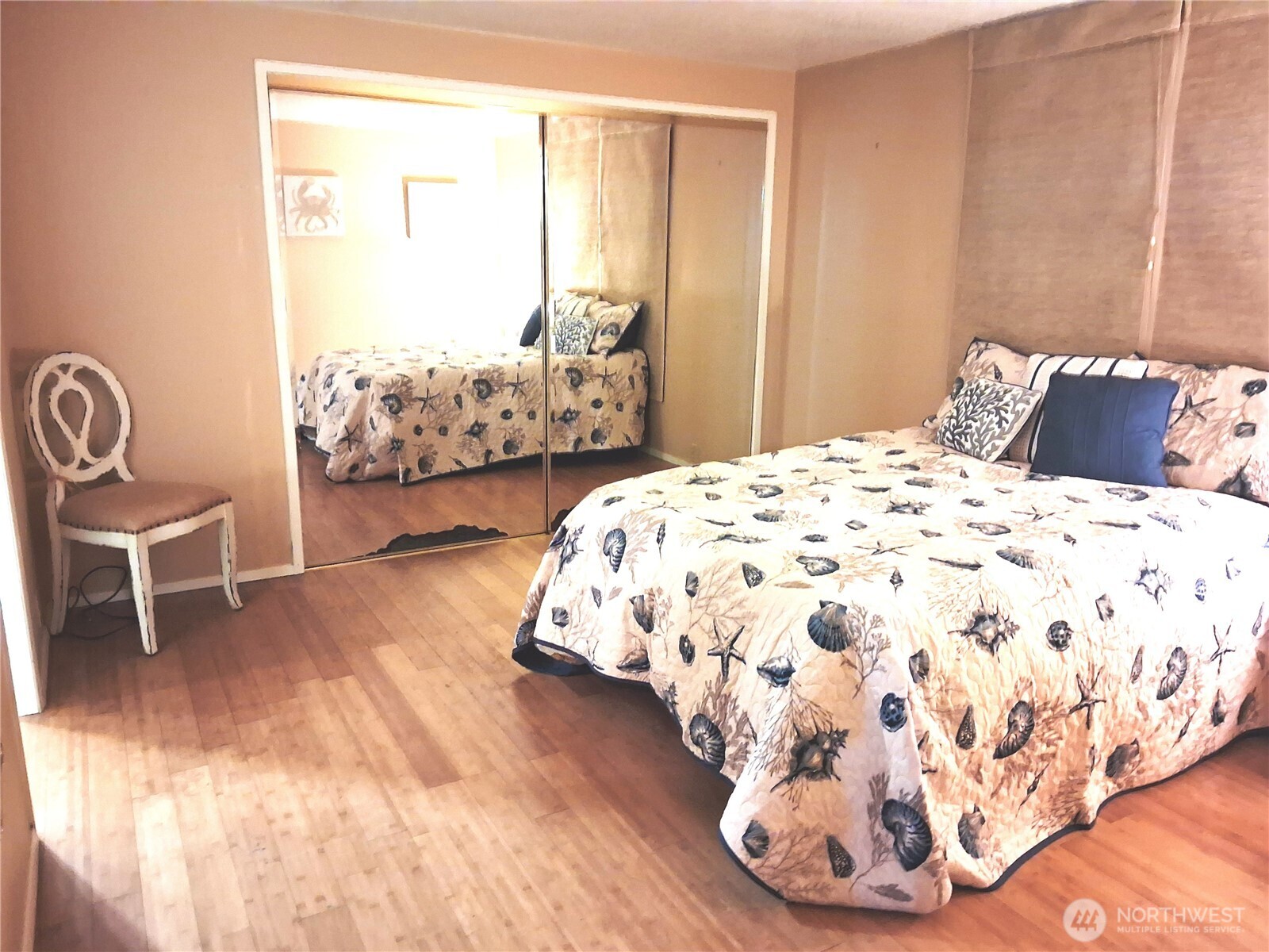 815 124th Street Southwest, Unit 36 Everett, WA 98204 - Photo 21 of 32 a bedroom with a bed and a chair