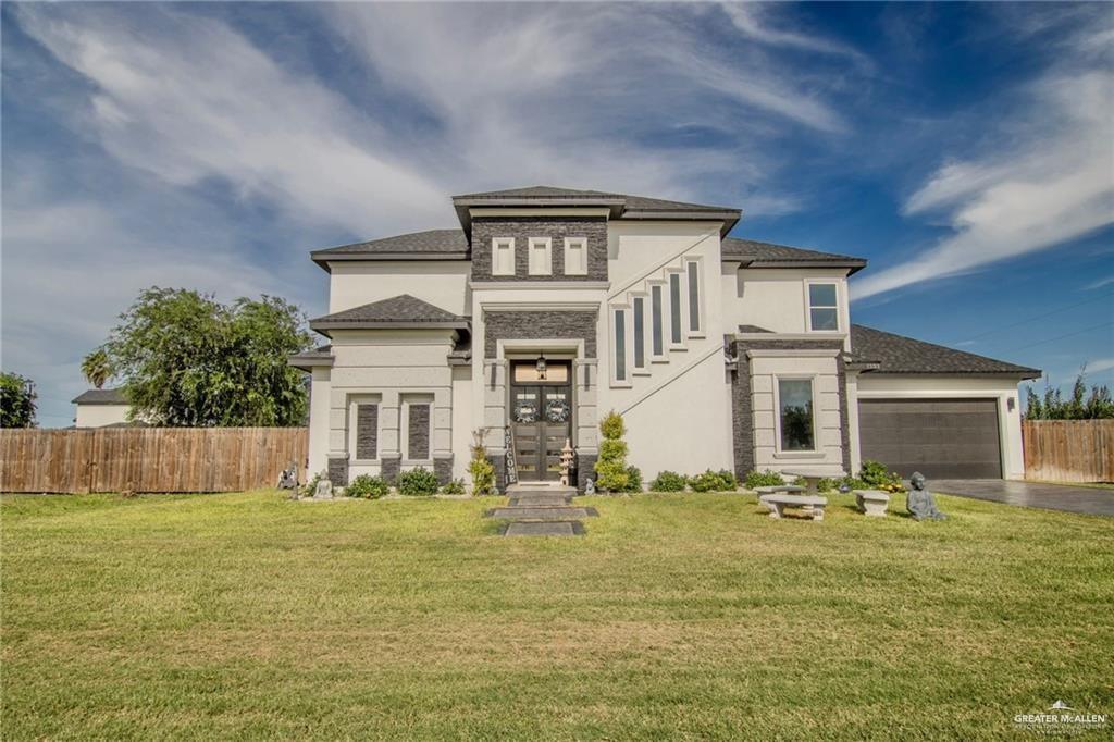 a front view of house with yard