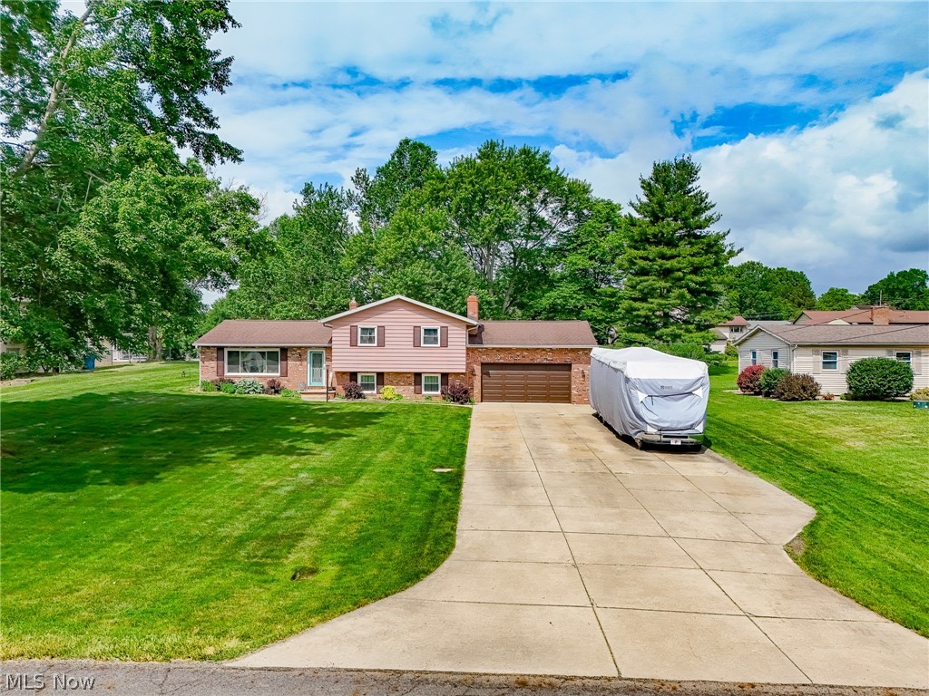 5862 Canterbury Road New Franklin, OH 44319 - Photo 3 of 45 Double wide concrete drive with additional pad for motorhome, boat or cars.