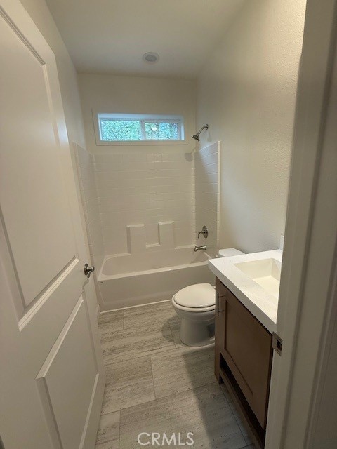 1281 Pleasant Valley Road, Unit 43 Diamond Springs, CA 95619 - Photo 14 of 14 a bathroom with a granite countertop sink toilet and shower