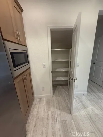 a view of a storage and utility room