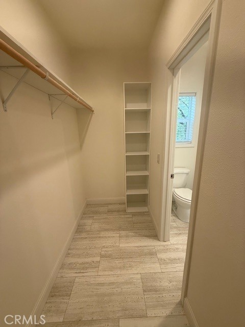 1281 Pleasant Valley Road, Unit 43 Diamond Springs, CA 95619 - Photo 10 of 14 a view of walk in closet with empty racks