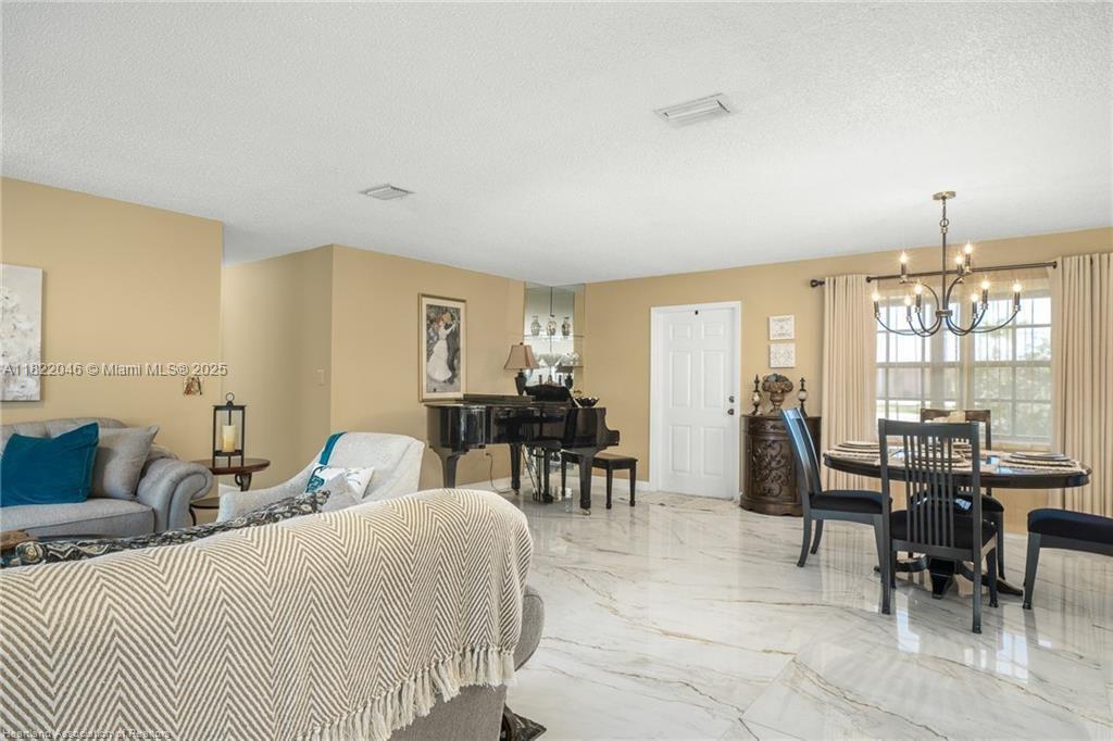 479 E Street Zolfo Springs, FL 33890 - Photo 16 of 50 a living room with furniture and a large window