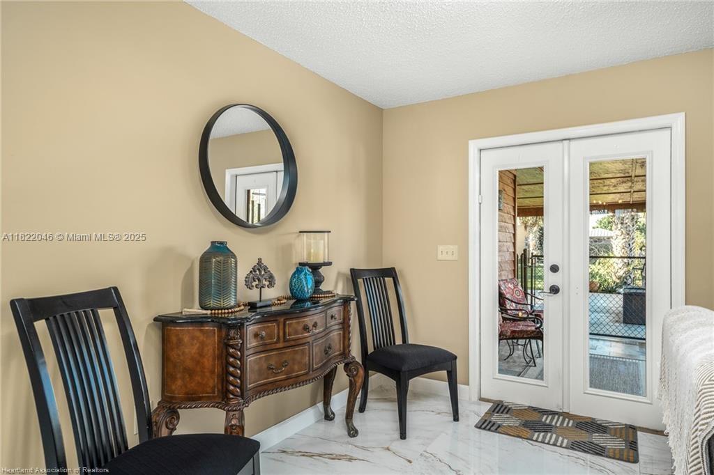 479 E Street Zolfo Springs, FL 33890 - Photo 2 of 50 a room with furniture and a window