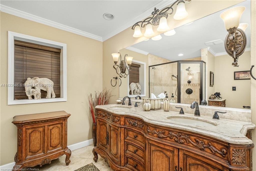 479 E Street Zolfo Springs, FL 33890 - Photo 21 of 50 a spacious bathroom with a double vanity sink mirror and