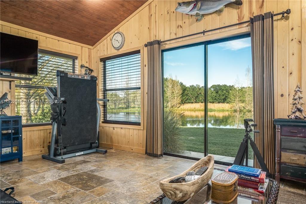 479 E Street Zolfo Springs, FL 33890 - Photo 31 of 50 a living room with furniture and a flat screen tv